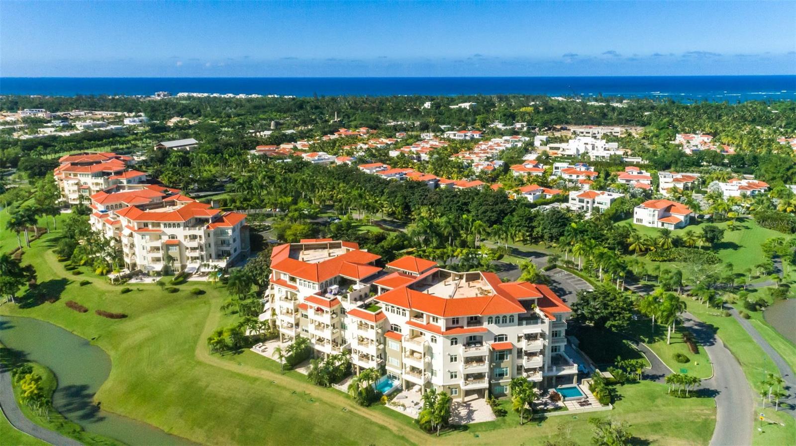Exclusive Penthouse at Plantation Village, Dorado BeachA rare and extraordinary opportunity to own one of the largest penthouses at Plantation Village within the Dorado Beach Ritz-Carlton Reserve Resort. This stunning two-level penthouse spans over 12,000 sq. ft., including 7,414 sq. ft. of luxurious wood and marble flooring interior space, complemented by 4,707 sq. ft. of expansive, covered and uncovered outdoor terraces offering sweeping views of the golf course and lush mountains.Designed for grand-scale living and entertaining, the penthouse features six bedrooms, eight full bathrooms, and four powder rooms, all meticulously appointed with exceptional finishes and attention to detail.On the first floor there are two bedrooms, four full bathrooms and two powder rooms. The second floor includes four bedrooms, four full bathrooms and two powder rooms. Vast windows adding natural light to shine through, furniture and accessories, thoughtfully conceived layouts and so much more making this remarkable residence an authentic gem. This residence was meticulously created with top-of-the-line finishes and custom details by renowned artist and designer Carlos Mercado-AD Studio Contemporary Art and Design.The gourmet kitchen is a place where you can have the most intimate and memorable dining experiences with loved ones or special guests.The fully equipped office room provides direct access to one of the terraces. Enjoy a nice workout in your home gym which includes equipment from Body Solid. Next to the fitness room is the entertainment room with a pool table by Olhausen, manufacturer of the best billiards in the USA. The private theater outfitted with plush upholstered seating, dramatic cove lighting to make viewing the large projection screens even more enjoyable, will be your preferred room whether you enjoy watching movies, a World Series Game, or the Super Bowl. The apartment has a full automations system including Lutron lighting and Sonos sound throughout.The open and covered terraces are the highlight of this residence where you can entertain the family and friends or simply have a relaxing time enjoying the panoramic view.For your convenience this property includes 4 garages for two cars including two oversized parking spaces right next to the elevator. In addition, there are two additional uncovered parking spaces for four vehicles parked back-to-back.Plantation Village is located in the Dorado Beach Ritz Carlton Reserve Resort, at a short golf cart drive from the Beach Club, the Water Mill Park, Fitness Center, tennis and basketball courts, golf course and the Club House with its two renowned restaurants.This Penthouse is offered fully furnished and equipped with top of the line appliances, commercial grade gym equipment, a $50,000 race car simulator and two Tomberlin golf carts.For further details of this impressive residence please don’t miss the video walkthrough.Experience the ultimate lifestyle, location, and luxury at Plantation Village-Dorado Beach!Private showings are only by appointment.