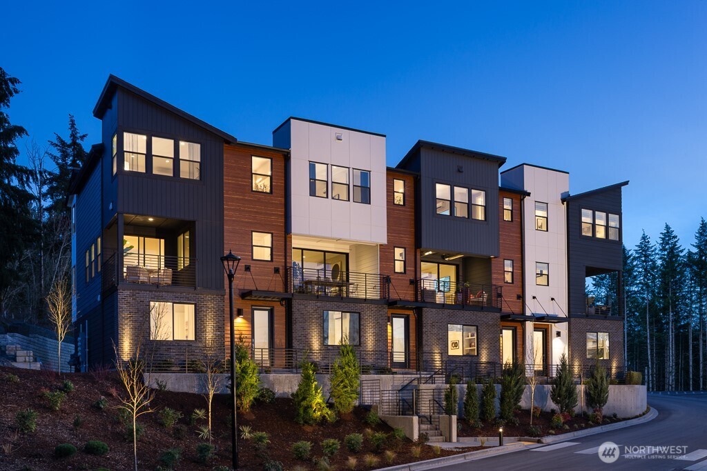 Cross Kirkland Towns by Toll Brothers - Luxury 4-bedroom townhomes featuring unique NW contemporary architecture & sleek interior finishes. 1st floor bedroom with 3/4 bath. The MARYHILL home design includes multi-slide stacked doors to the spacious covered deck bringing in an abundance of light to the great room w/ gas fireplace. Kitchen is expertly crafted with large center island and appliances of your choosing. Select your interior finishes at our Design Studio & create your unique, one-of-a-kind home! Community walking paths connect to a playground, pickleball court, dog walk & direct access to the Cross Kirkland Corridor. Centrally located to nearby restaurants & shopping + easy Eastside commutes. Broker must accompany Buyer 1st visit.