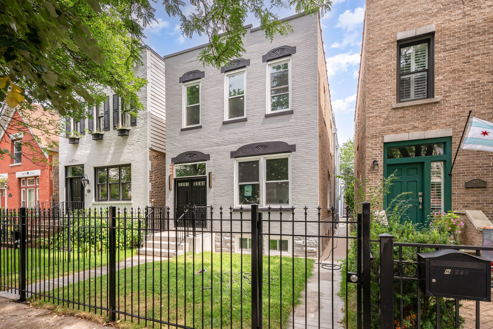Welcome to 1433 N Oakley - a refined urban retreat in the heart of Wicker Park. Step into sophistication in this stunning architectural gem nestled in one of Chicago's most vibrant neighborhoods. With over 3,400 sq ft of meticulously designed living space across three levels, this 4-bedroom, 4.1-bathroom residence seamlessly blends the tranquility of suburban living with the energy of city life. A recent addition has elevated the home's footprint and functionality, showcasing a thoughtfully designed open-concept main level. Here, a chef's dream kitchen awaits-featuring custom cabinetry, a massive center island, top-of-the-line Thermador appliances, and newly installed hardwood flooring. The layout flows effortlessly into the dining room, living room, family room, stylish powder room, and a practical mudroom. Upstairs, you'll find three generously sized bedrooms, each with its own en-suite full bathroom. The primary suite is a showstopper-bathed in natural light and outfitted with high-end finishes, offering a spa-like retreat. A convenient second-floor laundry room adds everyday ease. The fully finished lower level is ideal for entertaining or relaxing, complete with a spacious recreation room complete with wet bar, ample storage, a fourth bedroom/office, and an additional full bath. Outside, the home boasts professional landscaping, a 2-car garage, and a private rooftop deck-perfect for enjoying city views or hosting guests. Located just steps from the best of Wicker Park, you're within walking distance to award-winning restaurants, boutiques, scenic parks, trendy cafes, yoga studios, transit, and the 606 trail. This is more than a home-it's a one-of-a-kind lifestyle experience where luxury, comfort, and location converge.