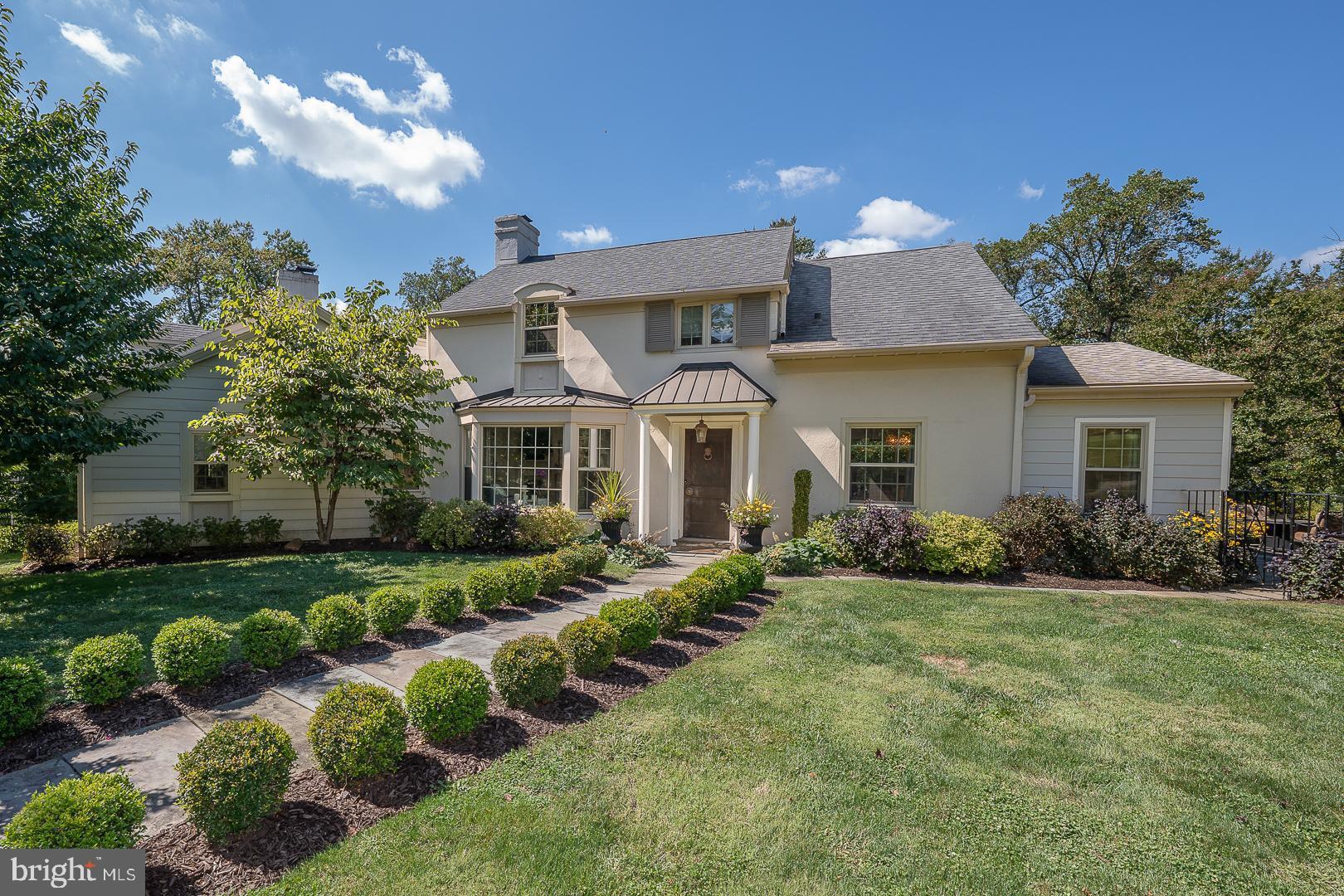 Welcome to this exceptional home where timeless elegance meets modern comfort. Nestled on a beautifully landscaped lot, this meticulously maintained residence offers the perfect balance of sophisticated living and everyday functionality. Step inside to discover sun-filled living spaces accented by hardwood flooring, custom millwork, and thoughtfully designed architectural details throughout. The heart of the home is the stunning gourmet kitchen featuring abundant cabinetry, expansive countertops, stainless steel appliances, a large center island, and seamless flow into the dining and gathering spaces—ideal for both entertaining and daily living. The spacious family room provides a warm and inviting atmosphere with a fireplace and large windows that bring the outdoors in. Multiple formal and casual living areas offer flexibility for hosting guests, working from home, or simply relaxing. Retreat to the impressive primary suite, a private sanctuary complete with generous closet space and a beautifully updated spa-inspired bath featuring dual vanities, a walk-in shower, and upscale finishes. Additional bedrooms are well-appointed and spacious, offering comfort and versatility for family and guests alike. The finished lower level expands the living space with room for recreation, fitness, hobbies, or a media area. A dedicated laundry room and ample storage further enhance the home's practicality.Outside, enjoy your own private oasis. The expansive patio and pergola create the perfect setting for outdoor dining and entertaining, while the lush lawn and mature landscaping provide beauty, privacy, and space to enjoy the outdoors. Combining quality craftsmanship, thoughtful updates, and exceptional indoor-outdoor living, this remarkable property offers a rare opportunity to enjoy comfort, style, and tranquility in one extraordinary home.Built in 1800, this home is registered as a Class II Historic Resource in Lower Merion Township. Enjoy timeless architectural integrity protected by municipal preservation guidelines. Property sold subject to standard Lower Merion Township Resale Use & Occupancy requirements. Buyer to verify all historic guidelines.