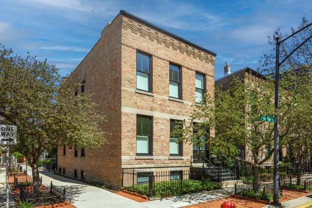 SOLD BEFORE PRINT.  Prime-corner, classic Chicago-brick home built in 1886 is situated perfectly in Old Town and combines historic exterior charm with a respectfully updated interior design. Conversion of this former two-flat into a single-family home was completed in 2017 and features three bedrooms & two full and one-half bathrooms.  An open-concept main level offers high ceilings, vintage moldings, modern kitchen and white painted wood floors. Formal living room offers original plaster moldings while a large dining room opens into a custom kitchen with honed Carrera marble and Soapstone countertops and high-end appliances (Sub-Zero, Fisher-Pykel, Bosch, Kohler). Library/Den continues in the back of the home with access to the back porch and shared courtyard. Third bedroom currently being used as office/workout space and powder room with vintage vanity complete this level.  White, painted wood floors continue onto the second floor. This level features a spacious laundry/utility room with ample storage and two large en-suite bedrooms with gorgeous custom bathrooms (wall-hung Duravit toilets in all bathrooms with Sensowash in primary bath) and walk-in closets. This home offers a sophisticated and truly unique living opportunity unlike anything in the neighborhood. It is within close proximity to the lakefront, Lincoln Park, Green City market, Wells Street restaurants and bars. Downtown is easily accessible by multiple forms of public transportation and Lincoln Park public & private schools are all within walking distance. This home is a true gem!