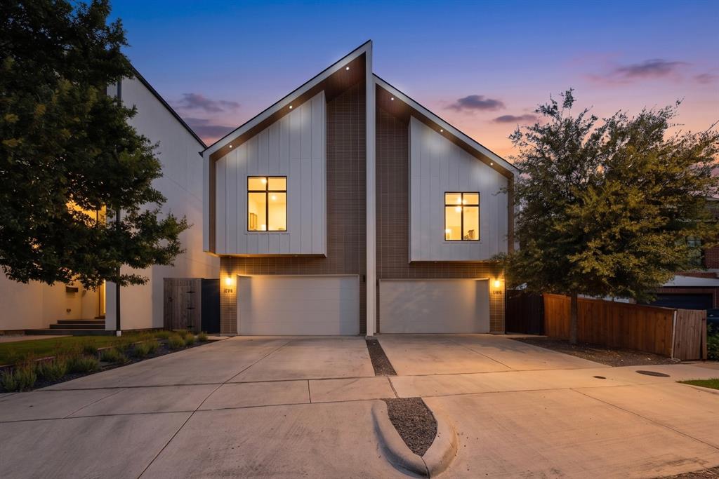 Modern architecture meets effortless living with NO HOA in one of East Dallas' most sought-after neighborhoods. Ideally located near Fitzhugh, Lower Greenville, and the M Streets, this sophisticated residence showcases soaring ceilings with exposed wood beams, expansive windows and an open-concept floor plan designed for both everyday living and entertaining. Recently refreshed with refinished hardwood floors and designer paint, the home offers a crisp, move-in-ready aesthetic throughout.  The chef's kitchen serves as the heart of the home featuring premium Dacor appliances, a built-in Dacor refrigerator, quartz countertops, custom cabinetry, and an oversized island with seating that seamlessly connects to the spacious living and dining areas. The private primary suite offers a spa-inspired bath with an oversized dual head shower & soaking tub, dual vanities and very generous walk-in closet. Upstairs each guest bedroom features its own ensuite bath providing exceptional privacy and comfort for family or visitors.  Downstairs offers a flex bedroom with closet or perfect office.  Built with foam encapsulation and tankless gas water heater for enhanced energy efficiency and year-round comfort, the home also includes a Tesla EV charger in the attached garage. Step outside to a beautifully designed, low-maintenance backyard complete with synthetic turf, mature trees and a covered cedar patio with gas connection providing an inviting space for relaxing or entertaining.  Just minutes from the restaurants, shopping, nightlife and parks this exceptional home offers modern design, luxury finishes, energy-efficient features and an unbeatable location.