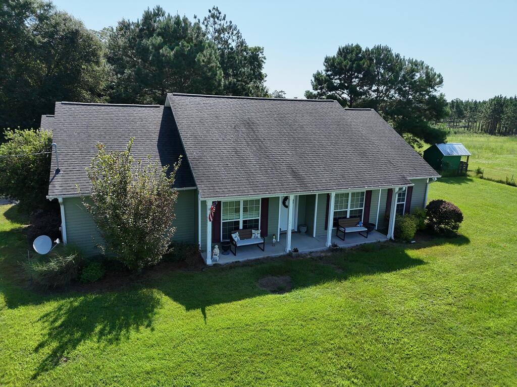 If you've been searching for your very own HOME ON THE RANGE, you may have just found it in Coolidge, GA! Situated on 37.24 acres, this remarkable 4BR/2BA home offers pastureland, horse and cattle stables, a stocked pond, abundant wildlife, riding trails, and so much more. Step inside to an inviting open living area, beautiful kitchen and dining space, and a spacious primary suite with private bath located at one end of the home. Three additional bedrooms are situated on the opposite end, each featuring its own walk-in closet, offering plenty of storage and a comfortable, functional layout. Outside is where this property truly shines! Walk out your front door and enjoy views of YOUR LAND in every direction. The acreage features fenced areas for livestock, established trails for riding and recreation, and a beautiful mix of open pasture and natural surroundings. Wildlife is frequently seen throughout the property, adding to the peaceful country setting. Spend your afternoons fishing in the stocked pond, home to bass, bream, and catfish, or gather with family and friends at the nearby pavilion for cookouts and picnics. Directly across from the home is a large fenced pasture ideal for cattle or horses. A 30x60 pole barn provides plenty of covered space for tractors, equipment, recreational vehicles, storage, hobbies, and more. With over 37 acres to explore, plenty of room to spread out, and a peaceful setting away from the hustle and bustle, this property offers the country lifestyle while still providing the comforts of a newer home. Whether you're looking for a private retreat, recreational property, space for livestock, or simply more land to call your own, this is one you need to see in person! Call your favorite Realtor TODAY for a closer look! Click here for virtual tour https://my.matterport.com/show/?m=zAnW4pCPcDc&mls=1