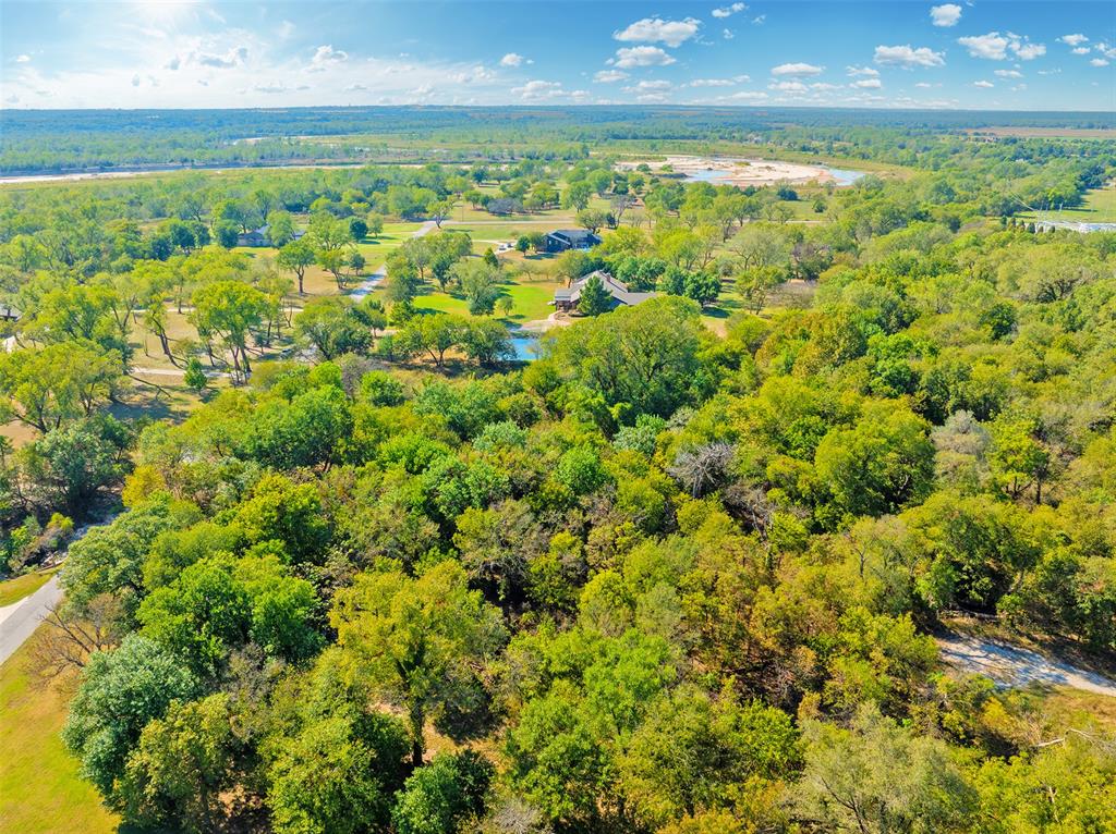 Build Your Dream Home on This Spacious 5-Acre Lot in One of Norman’s Most Sought-After Neighborhoods!  This generous 5-acre property offers the perfect blend of privacy and prestige, surrounded by beautiful, high-end homes in an established community. Whether you’re looking to create a peaceful retreat or a family estate, this lot provides plenty of space and endless possibilities.  Enjoy the convenience of being just minutes from everything you need. The Fashion Mall is only 2 miles away, with shopping, dining, and entertainment options at your fingertips. Nearby, Target and several local coffee shops make everyday errands easy and enjoyable.  Nature lovers will appreciate close access to Cherry Creek Park, Normandy Park, and Lions Memorial Park, all offering walking trails, playgrounds, and open green spaces for relaxation and outdoor fun.  With quick access to I-35, commuting or weekend adventures are simple and stress-free. Plus, the property features a charming creek — a unique natural touch that adds to the character and potential of your new home site.  Bring your builder, explore the possibilities, and imagine the home you can create on this exceptional 5-acre parcel!  Buyer brokers are warmly welcomed.