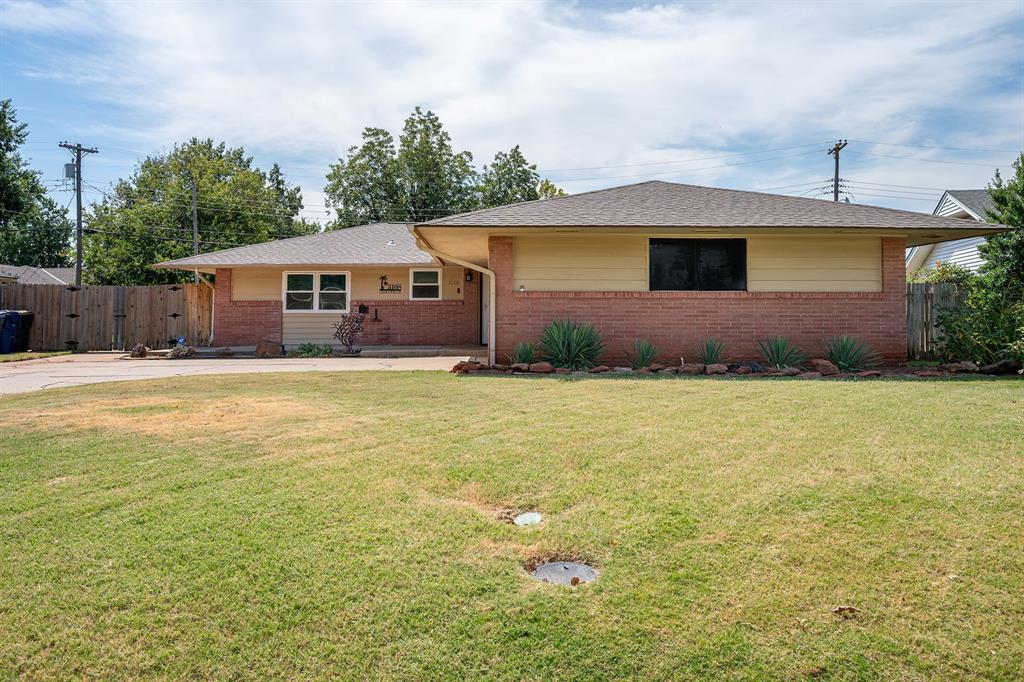 This 3-bedroom, 2-bath home offers comfortable living spaces and a private backyard with an in-ground pool. The living room features a fireplace and large window that fills the space with natural light. The kitchen includes white shaker-style cabinetry, subway tile backsplash, and a dedicated dining area. The primary bedroom features a modern ensuite with a tiled walk-in shower. Outside, enjoy the covered patio overlooking the in-ground pool and fully fenced backyard. Conveniently located just minutes from Lake Hefner, highway access, dining, shopping, and entertainment.