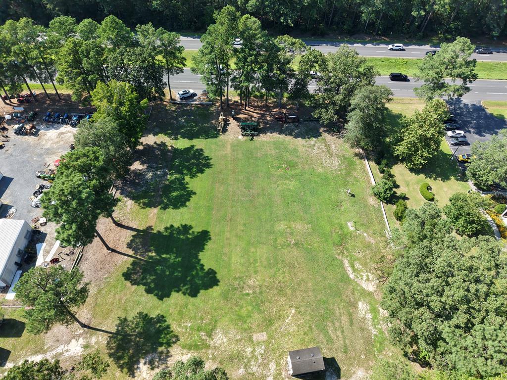 Unlock the potential of this prime commercial property, consisting of Lots 6 & 7, spanning 3.04 acres along the busy Lankford Highway in Accomac, VA. This site presents an exceptional opportunity for various business ventures, enhanced by its high visibility and heavy traffic exposure. Equipped with a well, septic systems, and electric access, the property is ready for immediate development. A laminated sign is prominently displayed, ensuring your business stands out. Additionally, a wide easement provides easy access for customers and deliveries. Don't miss your chance to invest in this ideal location for your next business endeavor.
