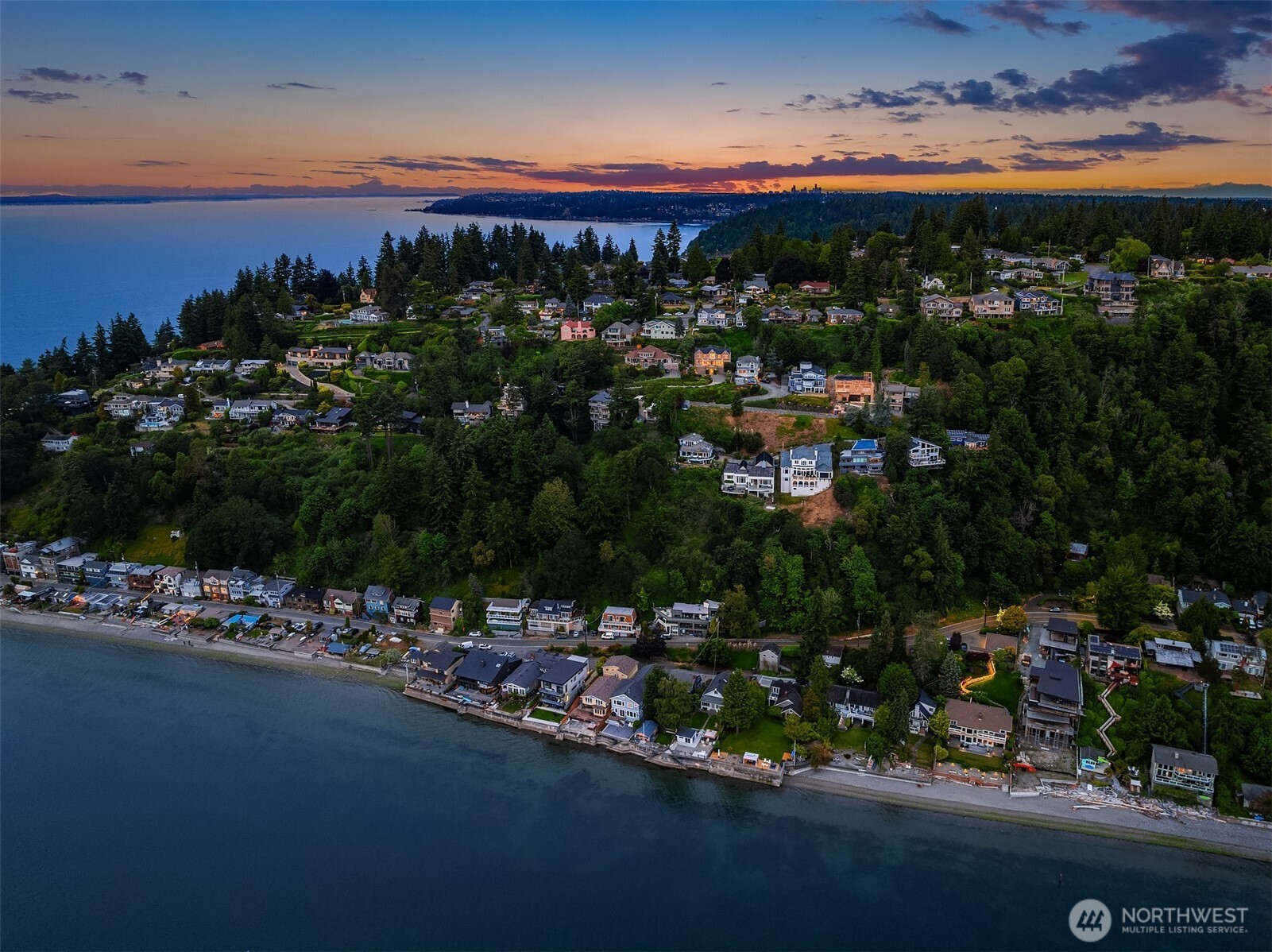 "La Maison"  Welcome to Three Tree Point waterfront lifestyle w/ this French-inspired residence where iconic PNW sea, mountain & island vistas set the stage for daily living. Concealed from the street & wrapped in mature landscaping, the home was designed to capture its mesmerizing views from all main living: Mt Rainier, Quartermaster Bay between Vashon & Maury Islands (known for its spectacular 4th of July fireworks) & world-traveling vessels quietly sailing along Puget Sound “Big Blue”.  An arched entry invites visitors to step inside to a spacious interior infused w/ charm & well-being. The generous great room (kitchen, living & dining) flows seamlessly to an interior courtyard w/ a refreshing fountain, while walls of French doors erase the line between in & outdoors. From morning coffee to dinner Al Fresco under the stars, the home lives as easily outside as it does in.  The upper level is devoted to rest/gentle concentration w/ a sizable, view primary ensuite & its spa bathroom, 2 additional bedrooms & a serene library/den. Explore the grounds & scenic vantage points, inviting quiet moments & connection to Nature. Wander up to the “Upper Green”, a top of the world perch ideal for meditation or simply taking in the panorama.  Enjoy the luxury of a double 2-car garages for 4+ vehicles, ample storage & guest parking for 6. Take the Indian Trail to the local public beach access. Olde Burien shops & restaurants are just min away. A short drive to airport & Downtown Seattle.