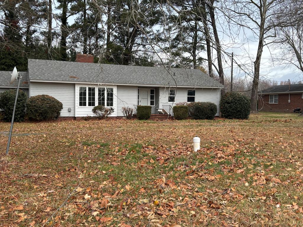 A charming and spacious ranch- style home in the small town of Nassawadox, convenient to Rte. 13 and all the amenities nearby.  This 3 bedroom, 3 bath home has a bonus suite in the rear that would be perfect for guests, a home office or a rec room.  Bathrooms have been partially updated.  The kitchen has new cabinets and countertops and is just waiting for your personal touch.  The enclosed porch has sliding doors and would be the perfect spot for your morning coffee.  One level living with space for a crowd, this lovely home is perfect for retirement, a growing family or your first home!