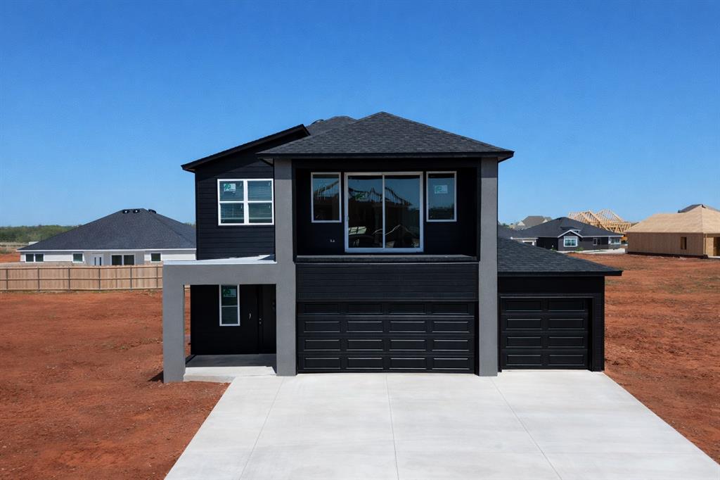 LIMITED INCENTIVE - Ask for details. Discover the Riverdale Modern with Balcony Design at 4213 NW 180th Terrace, the highly sought-after floor plan in the vibrant Anthem community!   Anthem offers the perfect balance of community living and urban convenience. This stunning contemporary home boasts 2050 square feet (mol) of thoughtfully designed space, featuring 4 spacious bedrooms and a versatile bonus room upstairs with its own private balcony, ideal for relaxing or entertaining. From the moment you step inside, you’re greeted by a grand living area anchored by a striking linear electric fireplace, creating an atmosphere of warmth and understated luxury. The expansive open-concept design flows effortlessly into the gourmet kitchen, a true centerpiece of modern style. If you’ve always wanted a chef’s kitchen, we’ve got you covered.  Homes include stainless appliances including a kitchen refrigerator & gas range, a spacious pantry, designer backsplash tile, and under-cabinet lighting. As the day winds down, retreat to the luxurious downstairs primary suite and indulge in the spa-inspired bathroom, thoughtfully designed to provide ultimate relaxation. Upstairs, a sleek modern staircase leads to additional bedrooms and bonus room, offering privacy and versatility for your family or guests. Also, included is a fully fenced yard with gate, zoned irrigation system, tankless water heater, and posttension engineered foundation provide peace of mind, while stylish white faux wood blinds throughout add a polished finishing touch.  This home is a place where memories are made! Anthem’s resort-style amenities include a pool, outdoor recreation areas, basketball court, playground, and pickleball court. Located minutes from top-rated Deer Creek Schools with easy access to Oklahoma City’s dining, shopping, and entertainment, Estimated Completion May 2026.  The photos are of a similar floor plan design with different finishes, and showcasing the builder's deisign. Welcome Home!