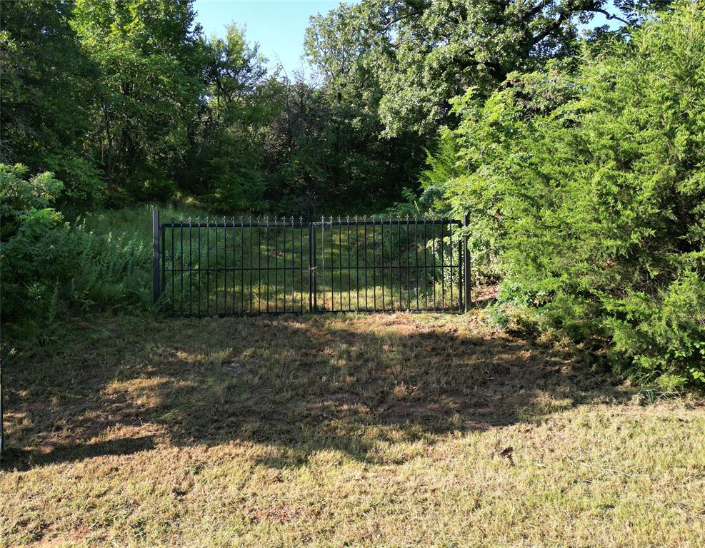 This beautiful 2.5-acre property in Edmond is a rare find. It’s covered with mature trees, offering privacy and a peaceful setting to build your dream home. There’s no HOA and no building restrictions other than no mobile homes, giving you the freedom to design what you want. The land is open and ready for your vision, whether that’s a custom house tucked in the woods or something more open. Located just minutes from the interstate, it’s easy to get anywhere while still enjoying the quiet of nature. Call today to come walk the property and see the potential for yourself.