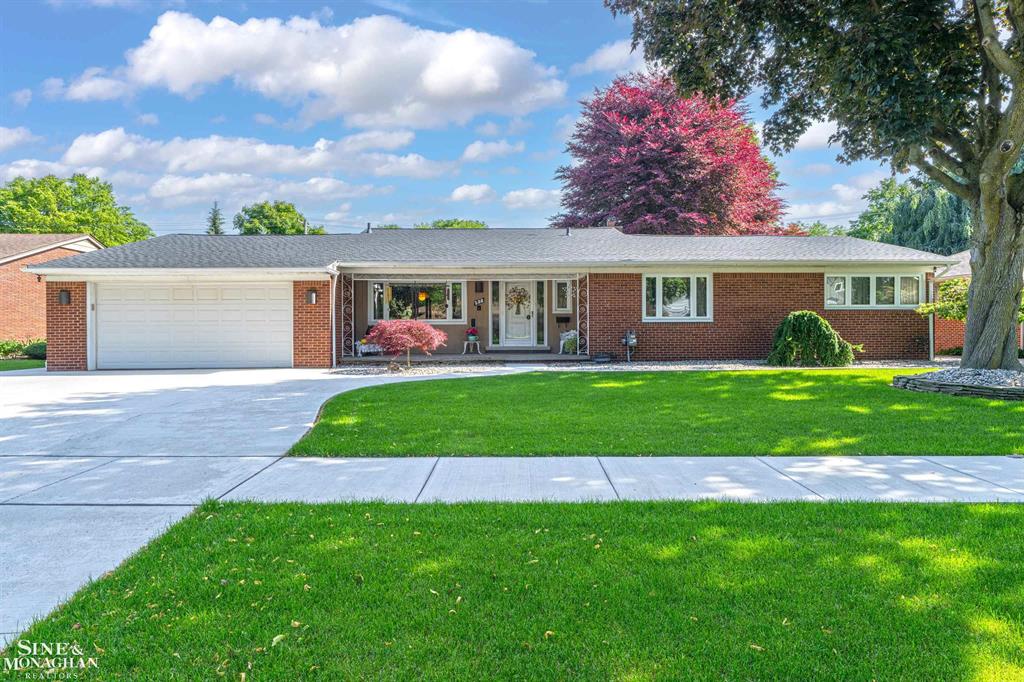 Wonderful ranch on one of the Woods quitest dead end streets. Main floor awaits your decorating touches. The fully finished lower level of this original family-owned ranch lives like a second floor-featuring a 28x12 eat-in kitchen with fireplace, a 20x17 great room, two large bedrooms, a full bathroom, and a walkout doorwall leading to a beautifully landscaped backyard. Perfect for entertaining, extended family, or multigenerational living. Step outside to your private oasis with a 20x40 in-ground pool, outdoor shower, and expansive patio. All 3 bedrooms, living room, dining room have hardwood floors. Family room has cork flooring and florida room has concrete floor. Over $200,000 in updates have been completed in the past 3 years, including $70,000 in new concrete (front and back), $55,000 in lower-level upgrades, and a newer roof and gutters. All pool equipment was replaced in 2023-including heater, pump, and all lines. This is a rare opportunity to own a well-maintained, highly improved home in a desirable neighborhood.