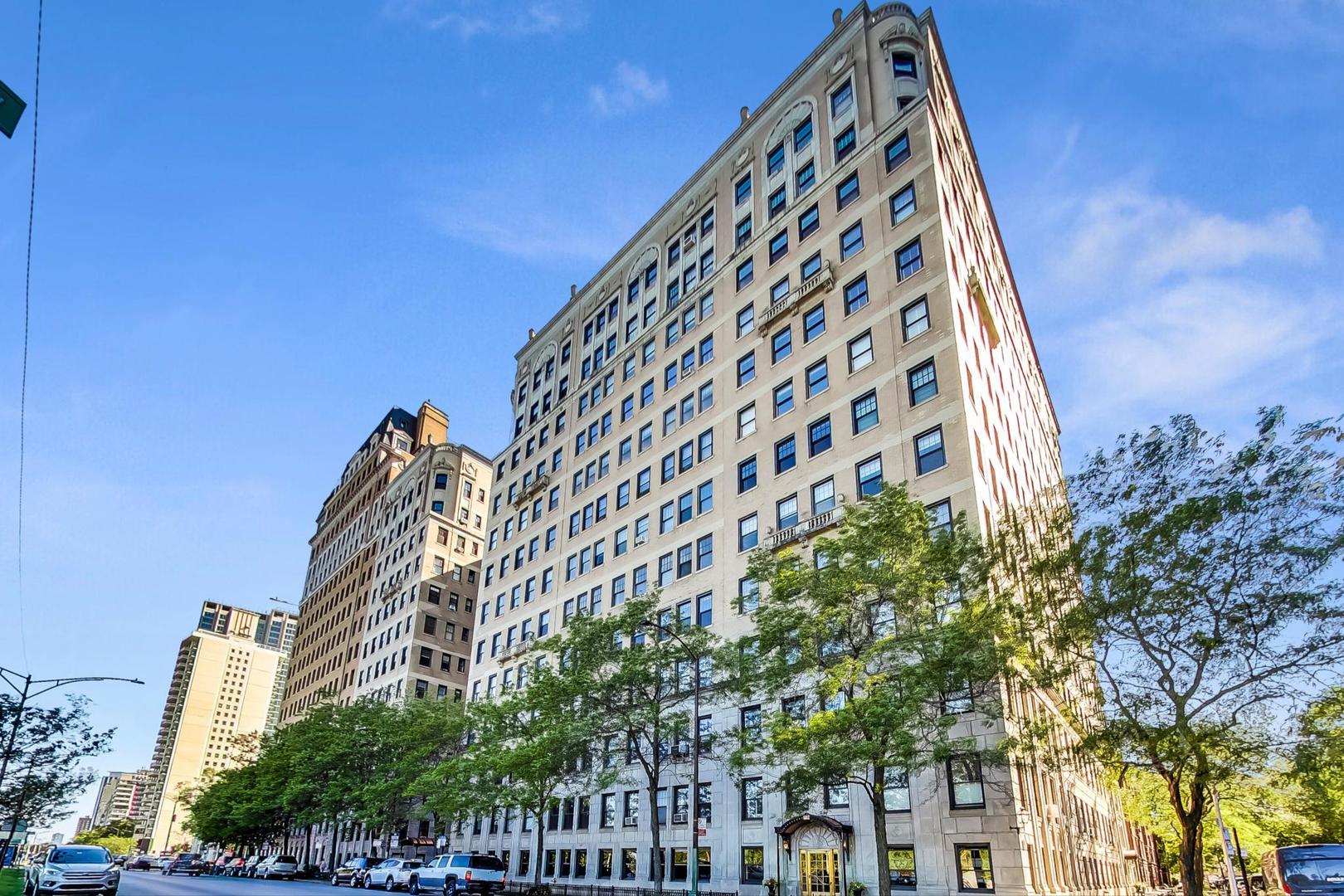 Come check out the breathtaking views of Lake Michigan from this gorgeous condo housed within a stunning vintage elevator building on Lake Shore Dr! With just 2 units per floor, this 3 bed, 3 bath, corner unit has everything that you're looking for with the perfect mix of renovated and vintage. There are two massive living areas showcasing picturesque views of the Lake. The second living space has a separate office with built-in shelving and desk. The kitchen was renovated from top to bottom with gorgeous dark grey shaker cabinets, white quartz countertops, gooseneck faucet, and stainless steel appliances. The primary bedroom spans the entire end of the unit with a massive walk-in closet and a hallway closet as you enter a nicely renovated en suite bathroom with modern double vanity, walk-in shower, separate jacuzzi tub, and floor to ceiling tile work. Both guest bedrooms are generously sized and feature two semi-ensuite bathrooms (one between both bedrooms and one between the bedroom and the second living room. Other features include hardwood flooring throughout, crown moulding, wide entry hall with cove ceilings, Spacepak air conditioning, Washer/Dryer in unit, and more. The building features a decadent vintage lobby, 2 enclosed courtyard patios, new fitness center, dry-cleaners, small commissary, receiving room, storage locker, freight elevator, bike room, and 24/7 maintenance. Unbeatable Lake View location! Enjoy easy access to public transportation with the Addison Red Line just moments away and multiple bus routes nearby (135, 151, 146). Embrace the outdoors with close proximity to Belmont Harbor, the Lakefront Trail, Belmont Dog Beach, Montrose Beach, Waveland Park Tennis Courts, and the Sydney Marovitz Golf Course. Everyday essentials are a breeze with Whole Foods and Jewel-Osco nearby, and you're just steps from the vibrant dining, nightlife, and shopping scenes along Broadway, Halsted, and near iconic Wrigley Field. Rental parking options available nearby. 2 pet maximum. Tenant Occupied with lease until 10/31/2025 as long as 60 day notice given by 9/1/2025.