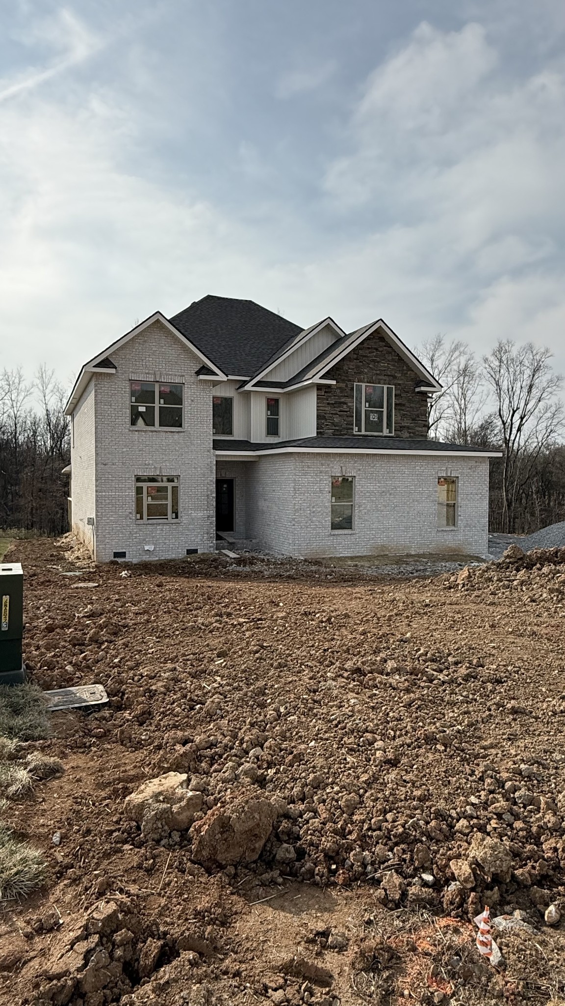 Crafted by Reda Home Builders, the Hightower floor plan is a refined new construction that combines architectural sophistication with commuter convenience, just 30 minutes from Nashville without the congestion or premium pricing of city living. Thoughtfully positioned, this home is designed for those who value both accessibility and a private residential setting,  The interior reflects quality craftsmanship throughout, featuring a 3-car garage and an expansive open-concept design suited for both everyday living and refined entertaining. A main-level bedroom with a private ensuite provides versatility for guests or a well-appointed home office.The upper level is anchored by a serene primary suite, accompanied by two additional bedrooms and a generously proportioned bonus room adaptable for media, fitness, or lifestyle use. With seamless interstate access and a tranquil residential setting, this property presents a rare balance of space, comfort, and efficiency. Photo is a SAMPLE.