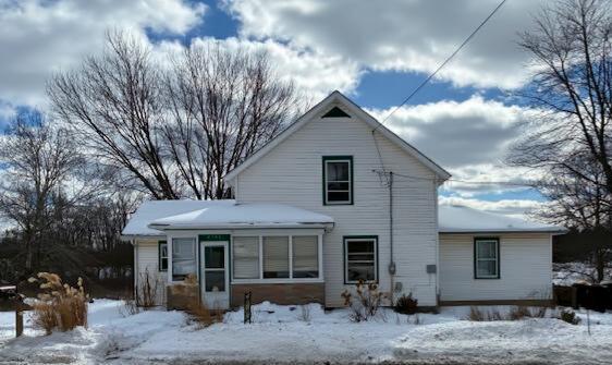 Country Setting in the Village of Stockbridge.This charming 3 bedroom, 2 bath farmhouse sits on 5.76 acres and offers the perfect blend of privacy and convenience. The property is ideally located adjacent to the Mike Levine Lakelands State Park and directly across from the Beckwith Nature Preserve--giving you instant access to miles of natural beauty.Inside, you'll find an eat in kitchen, a dedicated laundry room, and a walkout basement for added flexibility. Outside, the large backyard features a chicken coop, utility shed, and play structure, making it easy to enjoy a homestead lifestyle.Recent updates include a new high efficiency furnace installed in 2025 and other mechanical improvements, providing comfort and peace of mind.Just a short walk brings you into town for shopping and everyday conveniences. This property truly lets you enjoy the best of both worlds--country living with village amenities close at hand. Parcels 33-42-16-26-131-006 & 006 also included in sale.