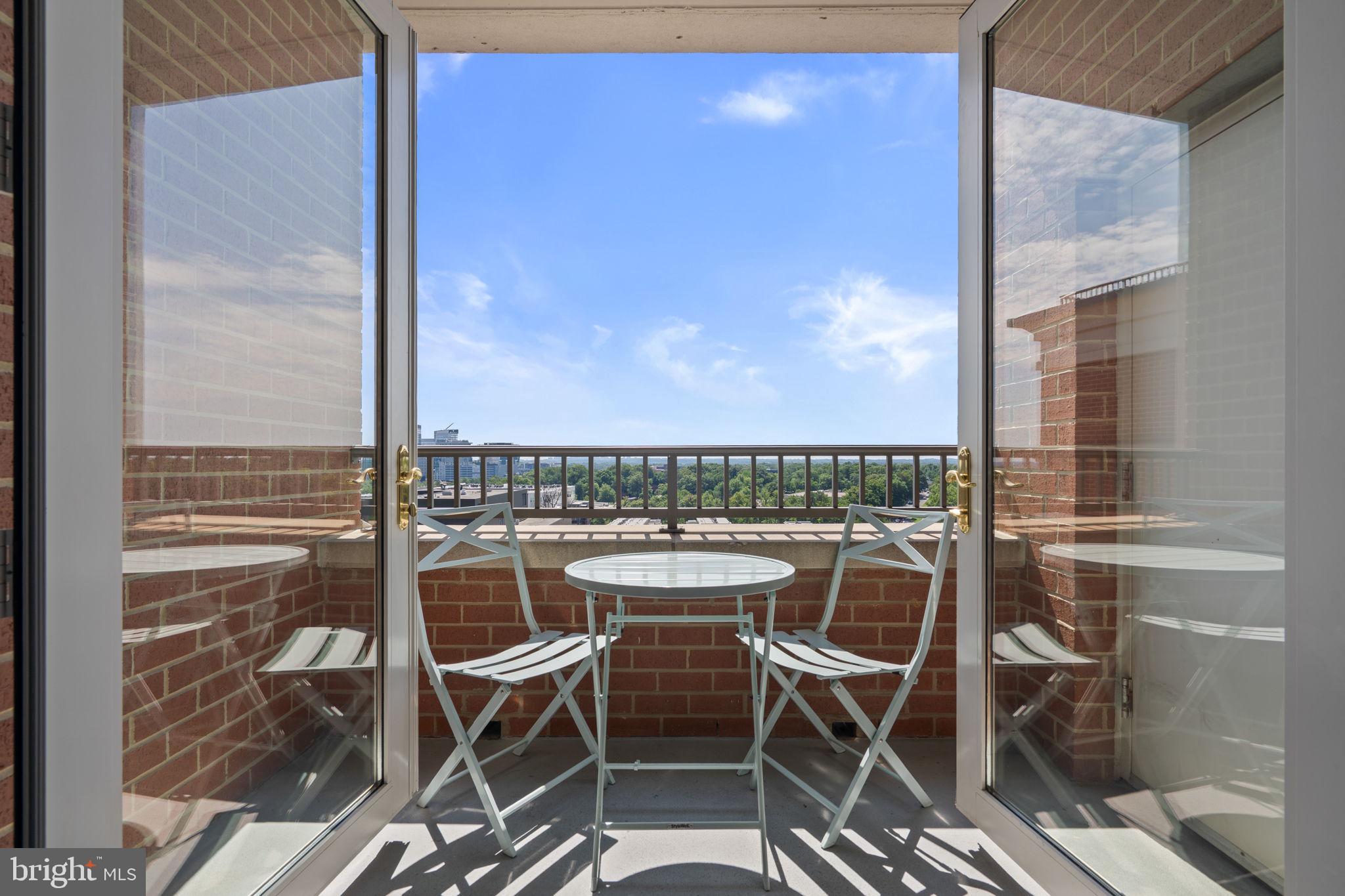 *** This condo is listed below its Tax Assessed Value, do not miss this opportunity! *** Now Presenting this 1 BR / 1 BA 690 Square Foot Condo With Unobstructed Ninth Floor East Facing Views and Assigned Underground Parking in The Popular Mercer Building in Reston. Upon entry to unit, you are met by tile flooring and large coat closet that leads to open concept floorplan and kitchen with quartz counters, stainless appliances including gas stove, white 42" cabinets and breakfast bar that overlooks living area. The living area has ceiling fan, pristine bamboo flooring, neutral paint and leads to private exterior balcony with aforementioned east facing unencumbered views. Primary bedroom also with ceiling fan, bamboo flooring, neutral paint and large sunny windows, with window treatments and large walk-in closet with Elfa closet system.  Connected primary bathroom includes granite counter vanity, tub / shower combination and access to in unit closet with stackable washer / dryer. The Mercer building is nearby upcoming commercial development for retail and restaurants. The building includes 24 / 7 secured entry, on site management with concierge service, package collection, a gym, seasonal pool, party room and courtyards for exterior space. The Mercer also has access to all Reston Association amenities including lakes, 15 outdoor pools, 52 tennis / pickleball courts, 35 tot lots, 30 multi-purpose courts, 15 picnic / pavilion locations and 55 miles of connecting pathways to define Reston’s “Live, Work, Play” motto. It has many Fairfax Connector Bus Stops nearby for public transportation purposes and is close to commuting roads Reston / Fairfax Parkways, with  nearly adjacent proximity to the Toll Road for commuting East to DC or West to Ashburn. Finally, it is located within 8 miles of Dulles Airport, 2 miles of Reston Town Center, which now includes Reston Town Center Silver Line Metro Station, 2 miles from Wiehle-Reston Silver Line Metro and less than 1 mile from Halley Rise development that includes Wegmans. The building accepts pets under 50 pounds and there are no investor ratios, providing flexible options for owners.