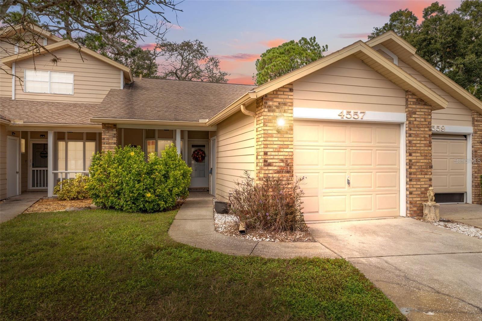 Florida living at its best! This two-bedroom, two-bathroom, one-car garage maintenance-free villa is situated in the highly desirable 55+ community of Briar Patch. Private backyard, nice views and no rear neighbors. Ready for you to just move-in! The nice front porch is perfect for enjoying the views and relaxing. As you step inside, the villa welcomes you with vaulted ceilings and a mix of tile and new laminate flooring throughout. The kitchen is equipped with a newer appliance package. Cooking and socializing become a delight with a breakfast bar that opens up to the great room. Glass sliders lead out to the Florida room. The spacious owner’s retreat includes a walk-in closet and an en-suite. Laundry with an included washer and dryer. Ceiling fans are installed throughout. The low HOA fee of $230/month includes a community pool, clubhouse, basic lawn care, lawn spray, fertilizing, weed control, irrigation system, roof, exterior painting, and exterior maintenance. Recently added double sinks in the master bath, insulation, ac ductwork and updated leaf guard gutters. Conveniently located near local attractions, shopping, and dining, this home offers a great living experience. Plus, it’s just a short drive to Tampa, the airport, and the beautiful beaches, providing endless opportunities for entertainment and relaxation. Schedule your private viewing! Motivated seller! This home is also eligible for Pasco County down payment assistance.