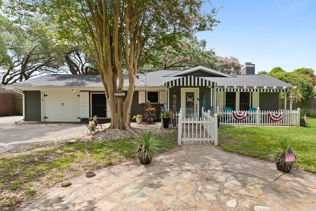 Discover one of the coast's best-kept secrets. Tucked away on South Paisano Dr., this hidden gem is home to an entertainer's delight, offering a one-of-a-kind retreat where comfort, style, and personality shine at every turn. Step inside to a spacious living room with soaring ceilings, a dramatic fireplace surrounded by shiplap detail, plantation shutters, and gleaming hardwood floors that set a warm, inviting tone. The chef's kitchen is a true showpiece, thoughtfully designed with a professional-grade gas range, quartz countertops, mirrored backsplash, stainless appliances, and an organized tile-accented pantry. Prepare to be wowed by the expansive primary suite—a serene haven with an entire wall of windows framing tranquil views, a spa-inspired ensuite with double opposing vanities, a large double shower, and a massive walk-in closet built for easy living. Outside, this private oasis invites you to entertain in style. Host unforgettable evenings on the huge deck, soak in the relaxing hot tub, or share the magic of your very own Palapa-topped treehouse—a whimsical escape that even features a resident peacock adding a splash of color and charm. Practical touches abound, including a sprinkler system and dedicated RV/boat parking, making this home as functional as it is beautiful. This is the coastal retreat you didn't know you were looking for—but will never want to leave. Schedule your private showing today and experience 1105 South Paisano for yourself!