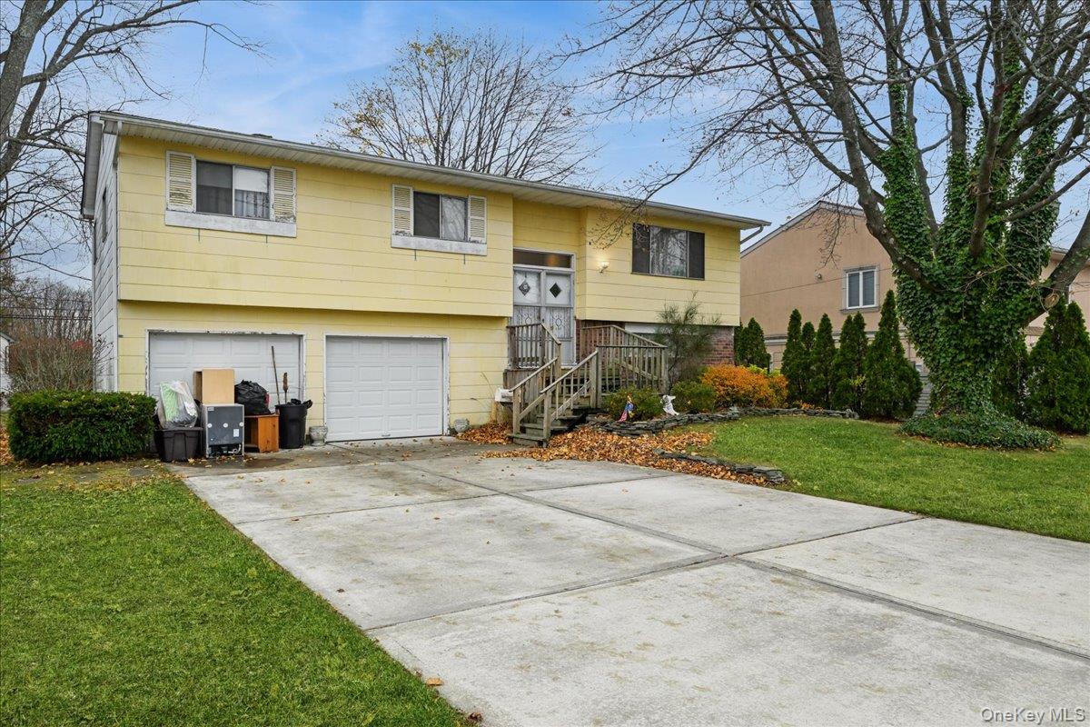ON HAYPATH ROAD THE PROPERTY'S LARGE....NEEDS SOME TLC BUT NOTHING TOO HARD....SUPER OPPORTUNITY 4 BEDROOM 2 BATH WIDE LINE HI RANCH....LIVING ROOM...FORMAL DINING ROOM..EAT-IN-KITCHEN WITH GAS COOKING...MASTER BEDROOM AND 2 ADDITIONAL BEDROOMS UPSTAIRS....FULL BATH...LAUNDRY ROOM HAS WASHER BUT NO DRYER....OIL HEAT GAS COOKING...LOWER LEVEL HAS A LIVING ROOM/OTHER ROOM...BEDROOM AND A FULL BATH WITH A SEPARATE OUTSIDE ENTRANCE....THE PERFECT MOTHER/DAUGHTER WITH PROPER PERMITS....ENORMOUS OVERSIZED 80X125 YARD....TAXES ARE APPROXIMATELY UNDER $15,000 WITH THE STAR....DO NOT WALK THIS PROPERTY AT ALL....