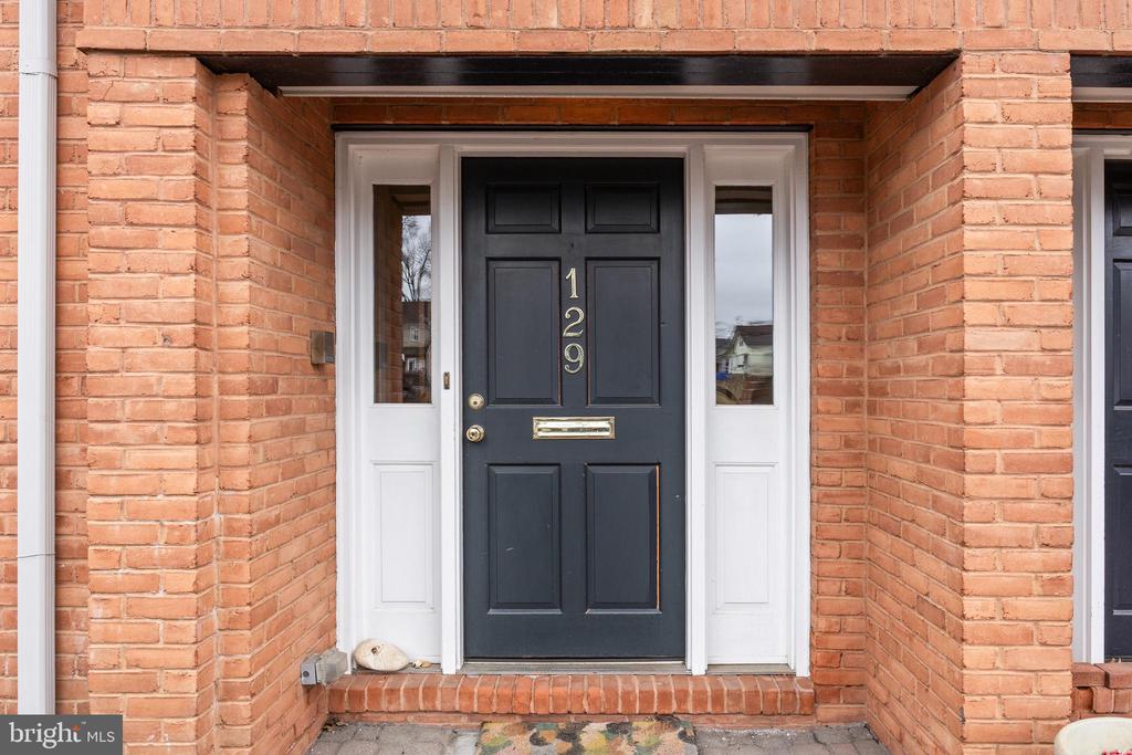 Welcome to an exclusive six-townhouse enclave at 129 Plum St, just a short stroll from Moorestown's vibrant town center. Upon entering, a two-story foyer leads to a mudroom hallway retaining the property’s original 1986 tile. Gleaming hardwoods span every level, including an entry-level en-suite boasting a renovated bathroom and direct greenroom access. For ultimate convenience, a private elevator services all four stories.The second level includes a half-bathroom and an updated kitchen with stainless steel appliances, a full range, and charming wooden cabinets with matching table and four chairs. A breakfast window overlooks a spacious, versatile area—perfect for a formal dining room or a cozy living room—complete with a warming brick fireplace and access to the deck for some fresh air. The third story offers three additional generous bedrooms and two full bathrooms. Two walk-in cedar closets, along with built-in cherry cabinetry, supplement this level. One bedroom currently serves as an office, featuring built-in shelving. The larger bathroom is appointed with a beautiful stone-tiled shower, an extra-long counter, and ample storage. Additionally, on this floor is the conveniently located laundry area. Downstairs, a finished basement—currently a workout retreat—awaits your final vision.Other features include: a 2-car garage with epoxy floor and extra cabinet storage, elegant louvered shutters on windows throughout the home, and dual zone HVAC. The current owners have lived in the home part time, leaving little to no wear and tear.Experience historic charm and ultimate convenience at 129 Plum Street. Steps from Main Street’s boutiques and top-rated schools, this perfectly situated gem offers a vibrant community lifestyle and seamless Philadelphia commutes.