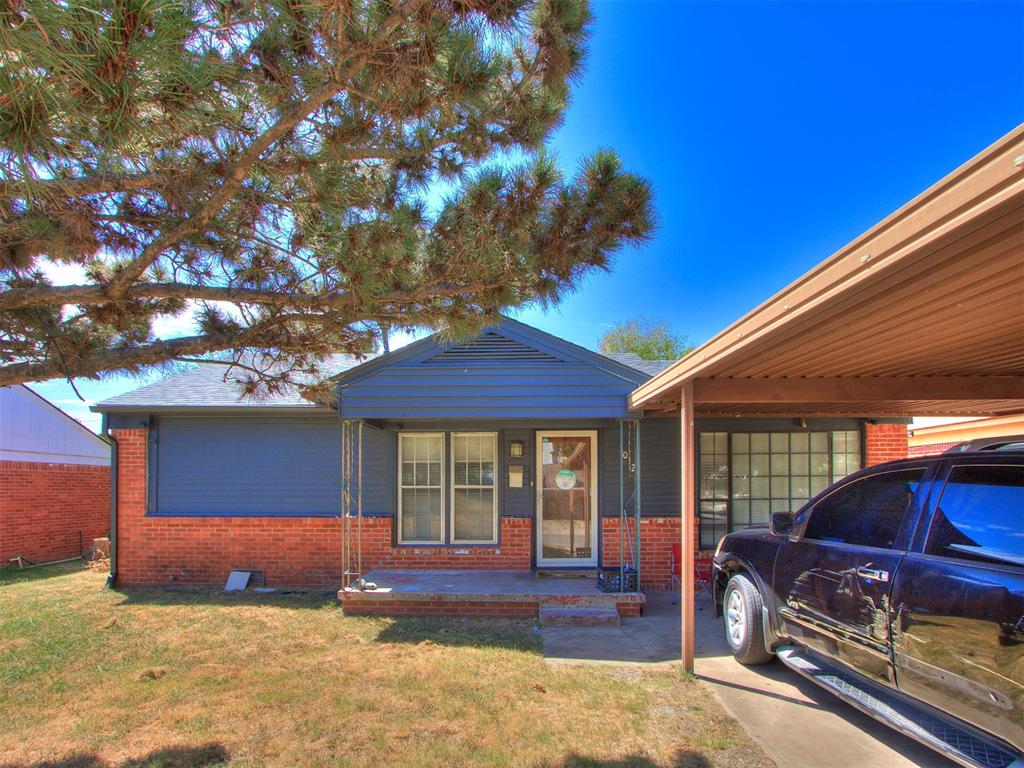 This 2-bedroom, 1-bath home lives larger than its footprint thanks to two distinct living areas, giving you room for both everyday living and a separate space to relax, work, or entertain. The kitchen opens directly to the main living space, and a dedicated laundry room keeps things tucked away and functional. Recent cosmetic updates give the interior a clean, refreshed feel. Outside, a 2-car carport provides covered parking and the generous yard offers plenty of room to expand, garden, or just enjoy the quiet outdoors.
