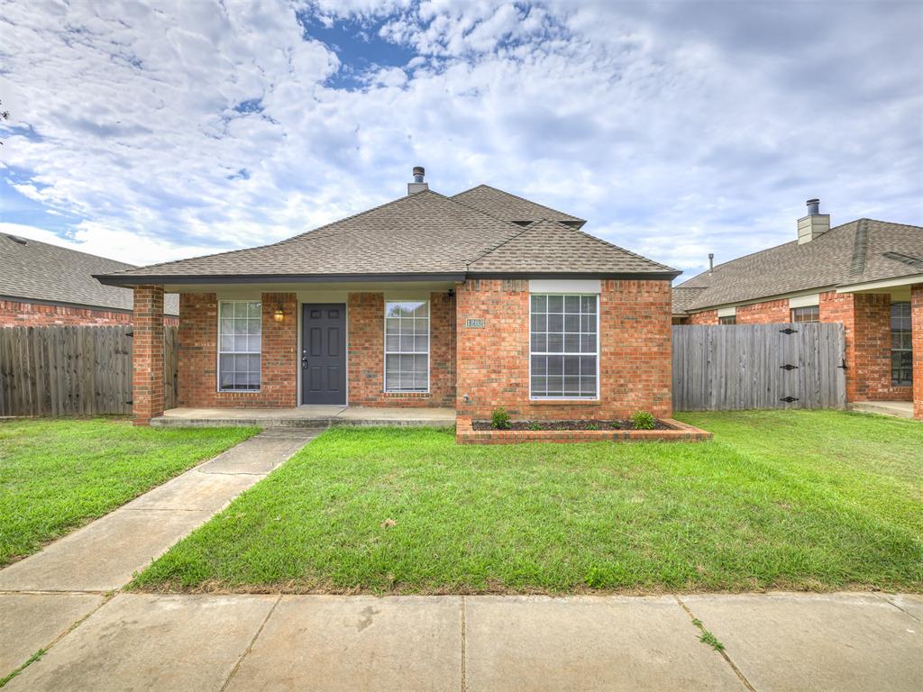 Open house Sun 7/27 2-4pm. This 3 bed home with no carpet is in great condition & move in ready! Do you live with someone who would like some privacy or work from home... the upstairs has a large bedroom with attached bathroom. It's separate from the other rooms & could also be used as an office. Downstairs, the primary bedroom not only has an en suite with large closet, but has a door to the yard with covered patio to enjoy your morning coffee. Off the kitchen, you'll find an additional yard with covered patio ready to grill dinner! The kitchen also has a pantry, island & gas stove. The ceilings in this home are so tall, making the home feel even bigger than it is. The living room features a beautiful corner fireplace with a built in bookshelf. Having no carpet makes this house very tenant friendly for investors & great for people not wanting to live with the dander & germs in carpet.