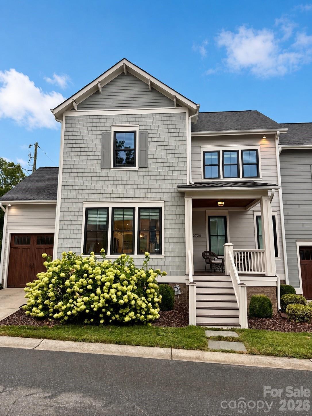 Two-story townhome tucked away on a quiet, private street in the heart of Plaza Midwood! This stylish 3-bedroom, 2.5 bath home offers a thoughtful blend of modern finishes, flexible living space and everyday comfort. The light-filled, open floor plan features wide-plank wood flooring and fresh paint throughout. At the center of the home, the spacious kitchen is perfect for gathering, with a large island, quartz countertops, subway tile backsplash, stainless steel appliances, a gas range. The main-level primary suite offers added privacy and convenience, complete with a well-appointed en suite bathroom. An attached one-car garage provides additional storage and easy access. Upstairs, two generously sized bedrooms feature hardwood floors, crown molding. Bathroom includes double vanities, chrome fixtures and abundant storage. A fabulous and functional bonus room offers endless possibilities - home gym, reading retreat, movie room. A similar unit has even transformed this versatile space into an additional primary suite or 4th bedroom. Enjoy outdoor living from the covered front porch, rear fenced backyard. Located just off Thomas Avenue and moments from The Workman’s Friend, Giddy Goat Coffee Roasters, The Improper Pig, Milkbread, the Plaza Midwood Library and more.