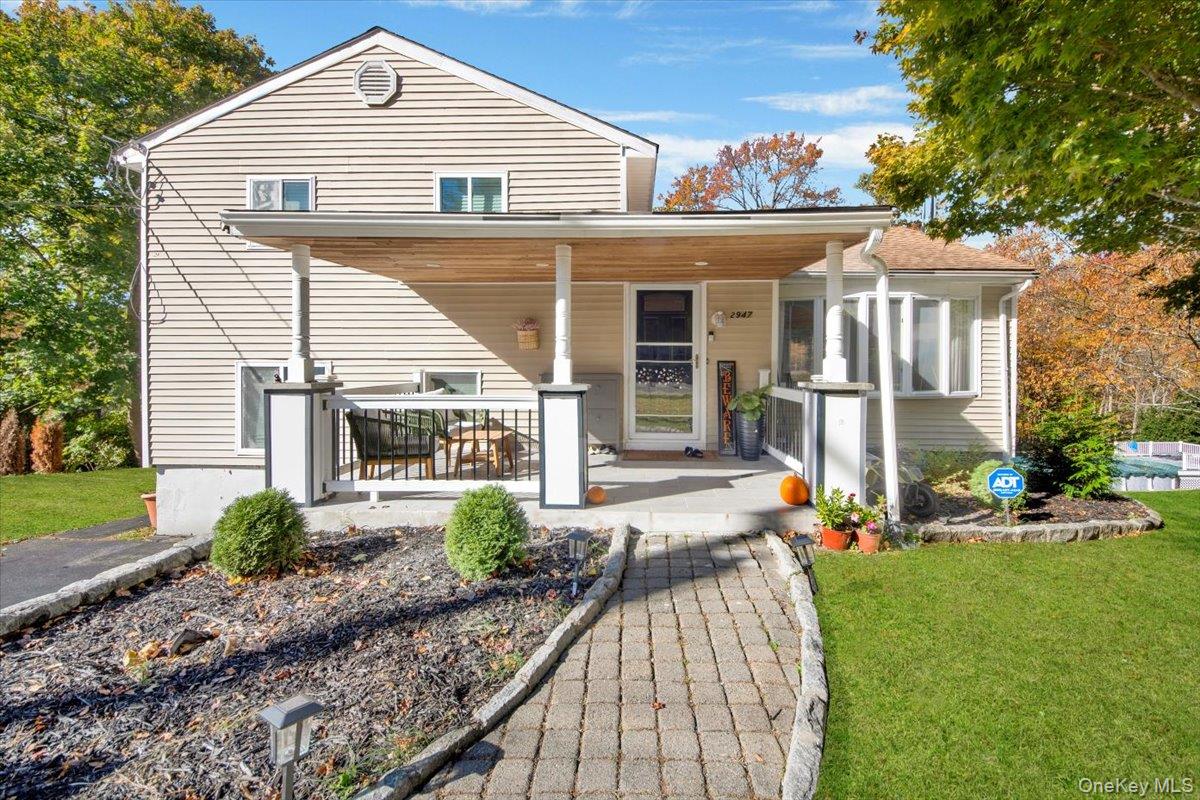 Welcome to this inviting home in the heart of Yorktown Heights! Perfect for multi-generational living or an in-law setup, this spacious property offers remarkable flexibility with two full baths, two laundry areas, and a beautifully designed main kitchen that serves as the centerpiece of the home. The main level is filled with natural light, highlighted by elegant moldings, oversized windows, and a large kitchen with a generous island and breakfast bar—ideal for both everyday living and entertaining. Upstairs, the spa-like bathroom features a deep soaking tub and separate shower, creating a peaceful retreat. The lower level includes a fully equipped summer kitchen, providing the perfect setup for extended family, guests, or independent living space. Step outside to your own backyard oasis featuring an above-ground pool, a double-level deck, and a dedicated fire pit area—perfect for summer fun, morning coffee, or cozy evenings under the stars. As a bonus, enjoy lake rights to nearby Sparkle Lake, perfect for paddleboarding, kayaking, or simply relaxing by the water. Located close to top-rated Yorktown schools, parks, shops, dining, and major commuter routes, this home seamlessly blends comfort, lifestyle, and location. Don’t miss your chance to make it yours!