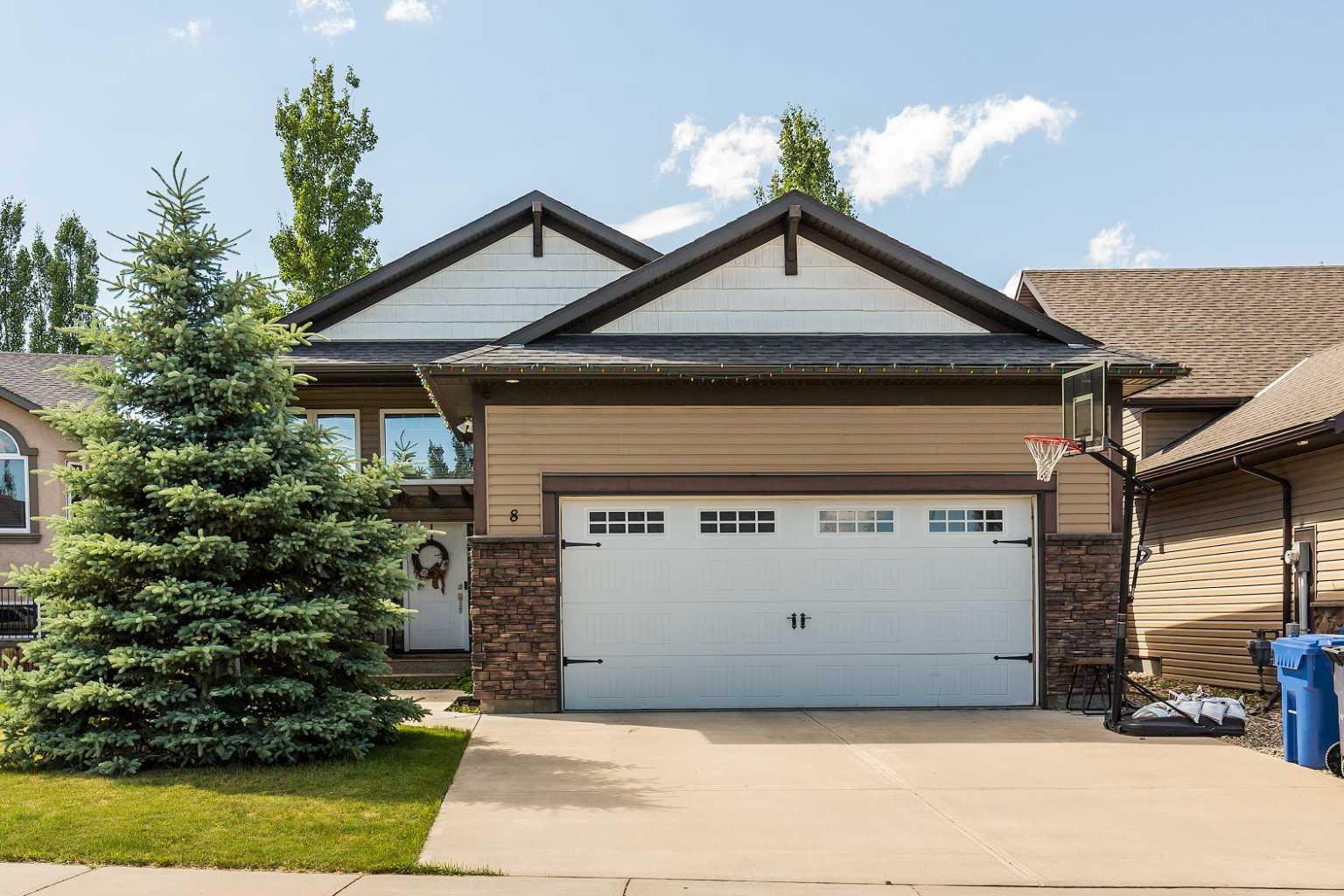 Warm, bright, and inviting, this beautifully maintained home offers a functional layout designed for everyday living and entertaining alike. From the moment you step inside, you’ll appreciate the abundance of natural light that fills the home, creating a cheerful and welcoming atmosphere throughout. The main level features a spacious living area that flows seamlessly into the dining space and kitchen, making it easy to stay connected with family and guests. The kitchen is both practical and attractive, showcasing granite countertops, ample workspace, and plenty of cabinetry for storage. Large windows allow natural light to pour in, enhancing the bright and airy feel of the home. With a total of five bedrooms, there is room for everyone. The upper level offers two comfortable bedrooms, including a generous primary retreat, while the fully developed lower level provides an additional three bedrooms, making this home ideal for larger families, guests, teenagers, or those needing flexible space for a home office, hobby room, or fitness area. The home is complemented by three full bathrooms, providing convenience and functionality for busy households. Thoughtfully designed living spaces throughout ensure there is plenty of room to gather together while still allowing for privacy when needed.  Step outside and discover a backyard designed to be enjoyed. The spacious deck is perfect for summer barbecues, morning coffee, or relaxing evenings with family and friends. Mature trees and established shrubbery create a beautiful setting and offer a sense of privacy while adding character and charm to the outdoor space. Children and pets will love the yard, and gardening enthusiasts will appreciate the established landscaping.  The double attached garage provides secure parking and additional storage, while the property’s curb appeal and welcoming exterior make a lasting first impression.  Combining warmth, functionality, and space, this wonderful home offers the perfect balance of comfort and practicality. Whether you’re hosting family gatherings, enjoying quiet evenings on the deck, or simply appreciating the bright and welcoming atmosphere, this property is ready to be enjoyed by its next owners. Don’t miss the opportunity to make this exceptional family home your own!