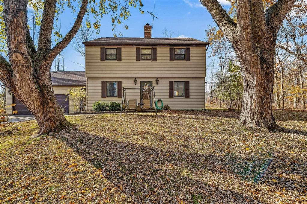 A fresh start in Bullock Creek with room to grow, play, and live your best life. This beautifully updated 3 bedroom, 2.5 bath home sits on over 5 acres, offering the perfect blend of modern convenience and peaceful country living. Bring the chickens, plant a garden, or build the treehouse the kids have been begging for. There is space here for all of it. Inside, you will love the stylish, move in ready updates including fresh paint, newer flooring, and a kitchen with newer appliances, a sunny breakfast nook, and a formal dining area for gatherings. Relax in the living room near the fireplace and take in views of your private backyard filled with wildlife. The living room has brand new carpeting! A smartly designed mudroom entry off the garage adds everyday functionality with laundry and a half bath right where you need it. City water, natural gas, and Charter high speed internet mean you do not have to give up modern comforts to enjoy the country life. The finished lower level offers bonus living space with a recreation area, office, and a wood burning stove for warmth and character. Upstairs, all three bedrooms are together, including a primary suite with its own full bath. Outside, the large newer composite deck sets the stage for summer cookouts, sunsets, and stargazing. Apple trees line your private driveway, welcoming you home to a wooded retreat that is close to Bullock Creek Schools and just minutes from Downtown Midland. Two parcels are included, each with their own tax code, and the additional parcel already has city water available, ideal for future expansion, a pole barn, or hobby farm dreams. A pre listing inspection is complete, and the home has seen numerous improvements within the last five years including appliances, gutters, shed, water heater, sliding and storm doors, central air, and a generator transfer switch. The septic field and furnace are both within their useful life, providing peace of mind for years to come. If you have been searching for space, privacy, and the freedom to live a littl