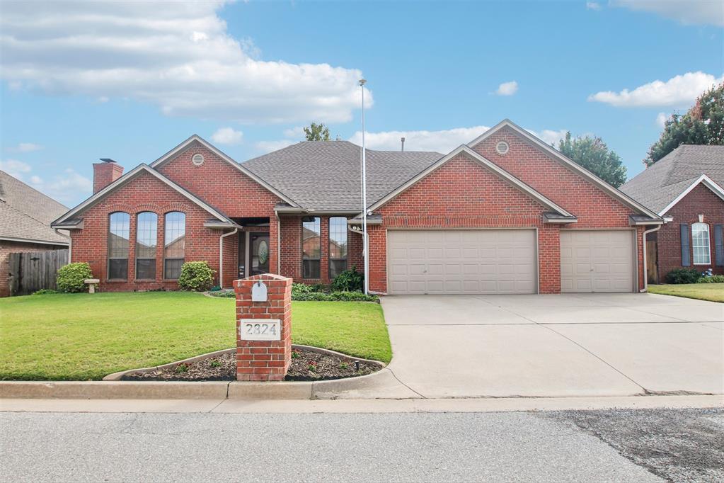 A pull-through garage with a covered third-car pad, storm shelter, and one-owner custom-built design make this home stand out from the start. Set on a 0.20-acre lot, it offers 4 bedrooms, 2.1 baths, two dining areas, a Jack-and-Jill bedroom and bath arrangement with flexibility for guests or multigenerational living. The fourth bedroom can also serve as a flex room, study, or hobby space.The living room feels bright and welcoming with great natural light, a fireplace, and built-in bookcases. Three of the four bedrooms have walk-in closets, and built-ins throughout the home provide even more storage. Extra-wide halls and doorways add flexibility for moving furniture and everyday comfort.The kitchen features updated counters, sink, and faucet, all replaced in March 2026. It also has a built-in stove and double ovens! Practical features continue with an attic lift and aluminum stairs installed in 2020, a sprinkler system, outdoor building, gas hookup for a grill, and a generator plug on the covered pad.The primary bath includes a walk-in tub and professionally installed grab bars. The roof was replaced in May 2024, and the HVAC was replaced in 2017 and serviced twice a year. The alarm system has keypads at all three doors, with new keypads and a cell unit installed in 2022. See how the thoughtful layout and features could work for you. Be sure to explore the 3D walkthrough, video tour, and detailed floor plan!