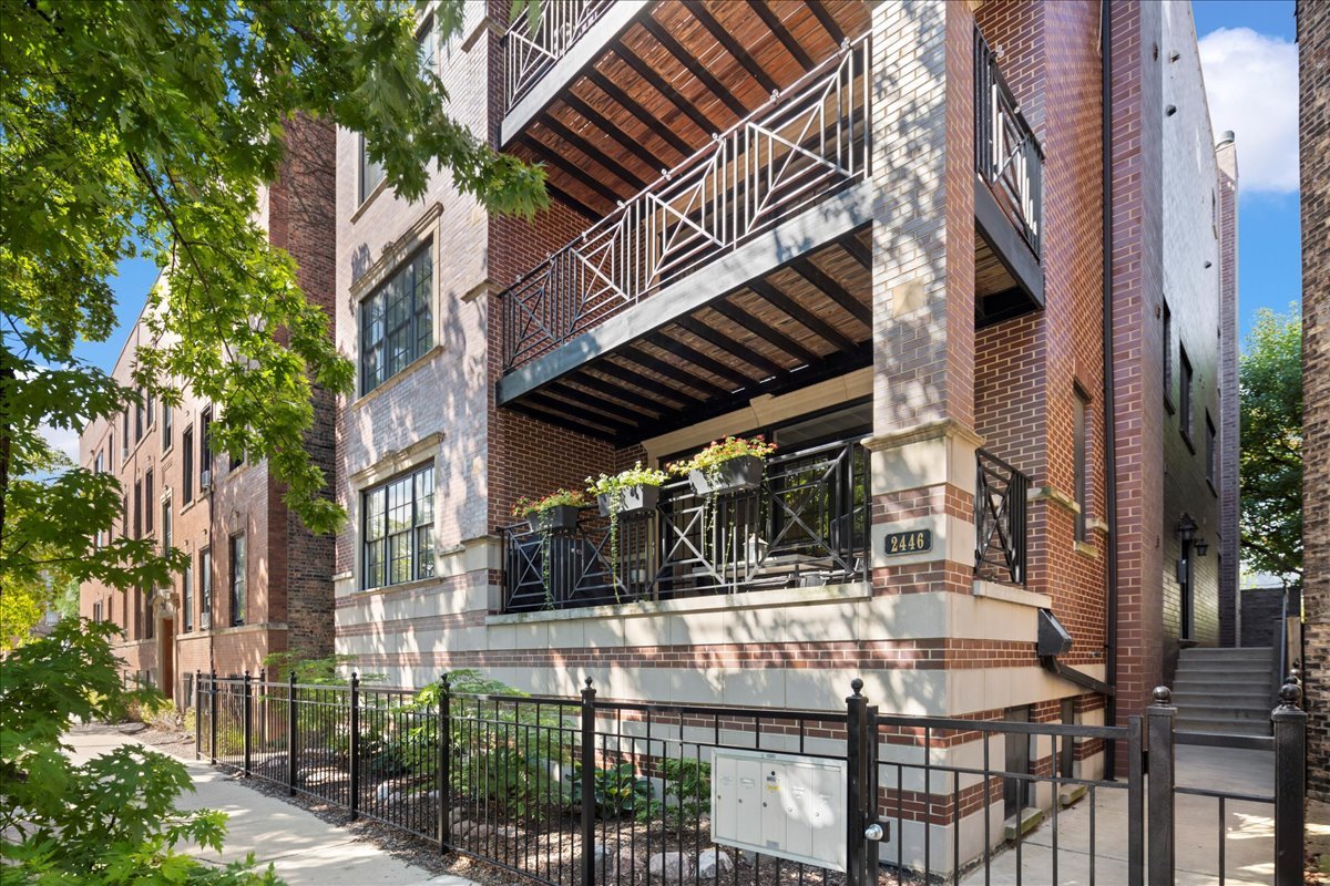Welcome to this ultra-wide luxury duplex down in the heart of Lincoln Park, offering timeless finishes, thoughtful updates, and an ideal layout for modern living. With a 32.5-foot interior width, this home combines superior craftsmanship with very generous proportions across two levels. The main level centers around a chef's kitchen with custom cabinetry, marble countertops, Viking appliances, and a large island designed for gathering. An adjacent formal dining room-framed by a wall of windows-provides both function and light-filled living space. The expansive open-concept living room is anchored by a custom marble wet bar with beverage fridge and a fireplace, and flows seamlessly with the outdoor terrace. Detailed millwork, crown molding, and wainscoting elevate the character throughout. Downstairs you will find 10-foot ceilings and radiant heated floors that set the stage for comfortable living. The primary suite features a custom walk-in closet and a newly renovated marble bath with steam shower, dual sinks and separate makeup vanity and storage. Two additional oversized bedrooms each provide large closets and the second full bath offers timeline design and finishes. Newer carpet, paint and lighting updates add a fresh touch throughout. Additional highlights include a main level powder room, solid core doors, a side-by-side washer/dryer, ample storage, and garage parking outfitted with EV charging (NEMA 14-50 outlet). Located just steps from Trebes, Jonquil, and Supera Parks, as well as neighborhood favorites like Avli Taverna, Juno, and Galit.