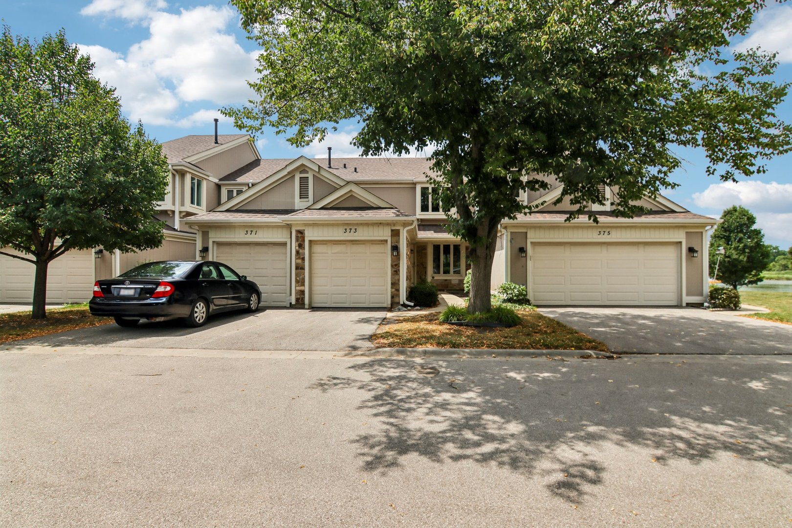 Beautiful lakefront setting on a quiet culdesac! Enjoy a desirable and highly soughtafter lakefront location with scenic views, prime lakefront living, and a serene backdrop that enhances everyday comfort. This home features two spacious primary suites on the second floor, each with private baths, ceramic tile flooring, and mirrored closet doors. Newer hardwood floors, crisp white 6panel doors and trim, and a ceramictile entry elevate the interior. The large living room offers a cozy fireplace and sliders leading to a private patio overlooking the gorgeous lakefront exposure. Bright eatin kitchen with oak cabinetry, breakfast bar, and ceramic tile. A fully finished basement adds valuable living space, plus an attached garage. Nestled on a private deadend street within the toprated Stevenson High School district, this home delivers comfort, privacy, and standout lakefront appeal.