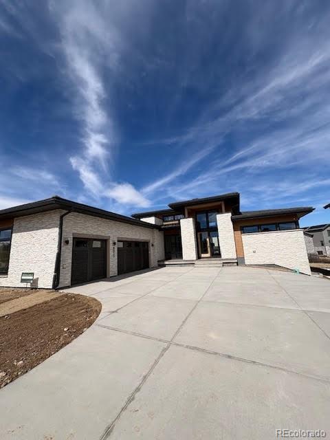 NEW RANCH HOME: SPRING MOVE-IN! Discover refined mountain living in this 4,116 sq. ft. home at The Summit at The Village at Castle Pines. Soar under vaulted ceilings as you gather around the dramatic  fireplace and slide open oversized glass doors to let the outdoors in. Cook and entertain in a chef’s kitchen that showcases Wolf & SubZero appliances, the soft sophistication of driftwood stained cabinetry complemented by a large island, and a butler’s pantry with prep sink that extends the joy of making meals. Retreat each night to a main-level luxury primary suite, where you can unwind by a romantic fireplace and refresh in a spa-inspired bath before stepping into a spacious walk-in closet. Host guests in the fully finished basement, where a sleek wet bar invites conversation, two ensuite bedrooms ensure comfort,  Savor your private backyard oasis as you glide out to grill on the built-in Wolf grill, gather by the modern firepit, and relax on the covered garden level deck designed for year-round Colorado living. Embrace the elevated lifestyle of The Village at Castle Pines, with resort-style amenities like private golf, pools, tennis, pickleball, fitness, trails, and a vibrant calendar of social events, all within a gated and pine forest-filled haven of nature. This home doesn’t just welcome you; it inspires you. Visit today. Floorplan displayed may vary from the actual home.