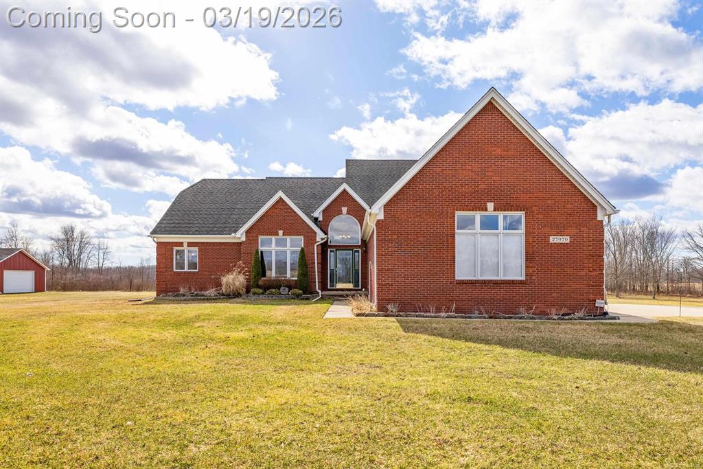 Nestled on a serene and private 15.32-acre property with hunting rights, this beautiful split-level brick home offers the perfect blend of comfort, character, and peaceful country living. Set far back off the road, the home provides exceptional privacy with virtually no traffic noise, creating a truly tranquil setting. Inside, you'll fall in love with the stunning vaulted ceilings accented by skylights, along with elegant arched and stained-glass windows that fill the home with natural light and charm. The stylish kitchen features granite countertops, a tray ceiling, and a cozy eat-in dining area, while a separate formal dining room provides the perfect space for gatherings and entertaining. The first-floor primary suite offers convenience and comfort with a spacious full bath and walk-in closet. Downstairs, the massive basement-already plumbed for a bathroom-offers endless possibilities to finish into your dream space, whether it's a recreation room, home gym, or additional living area. Outside, a large pole barn provides the perfect setup for a mechanic's garage, workshop, or hobby space, offering plenty of room for tools, equipment, and projects. Surrounded by beautiful acreage and nature, this property is a rare opportunity to enjoy privacy, space, and the outdoors while still having a warm and welcoming place to call home.