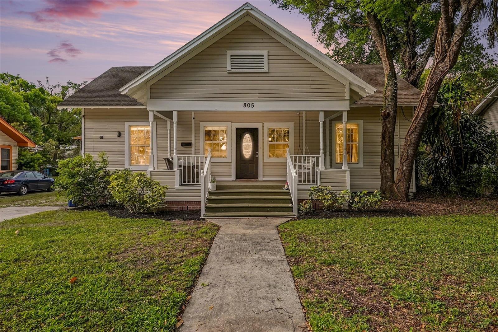 Seminole Heights charmer with standout outdoor space. This 3-bedroom, 2-bath bungalow in Southeast Seminole Heights sits on an oversized lot with a backyard full of potential and a layout that makes the most of the space. Inside, you’ll find wood flooring, a bright and open feel, and a spacious living area that flows easily into the dining space and kitchen, making it ideal for both everyday living and entertaining. The kitchen features solid wood cabinetry, stainless appliances, and generous counter space, all positioned to stay connected to the main living areas. The front porch adds to the home’s classic bungalow charm and offers the perfect spot to start or end your day. Out back is where this property offers a unique opportunity. The elevated Trex deck creates a natural gathering space for relaxing, dining, or hosting, while the deep backyard provides flexibility for expansion, gardening, or creating your own outdoor retreat, with mature trees adding a sense of privacy. A storage shed adds additional convenience. All bedrooms are well-sized with flexibility for guests, a home office, or additional living space depending on your needs. Located just a short walk to local coffee shops, breweries, and neighborhood favorites, with easy access to downtown Tampa, Armature Works, and the Riverwalk, and approximately 10 minutes to the University of Tampa, making it a great option for a first-time buyer or a shared living setup. If you’ve been looking for space, character, and potential in Seminole Heights, this is one you’ll want to experience in person.