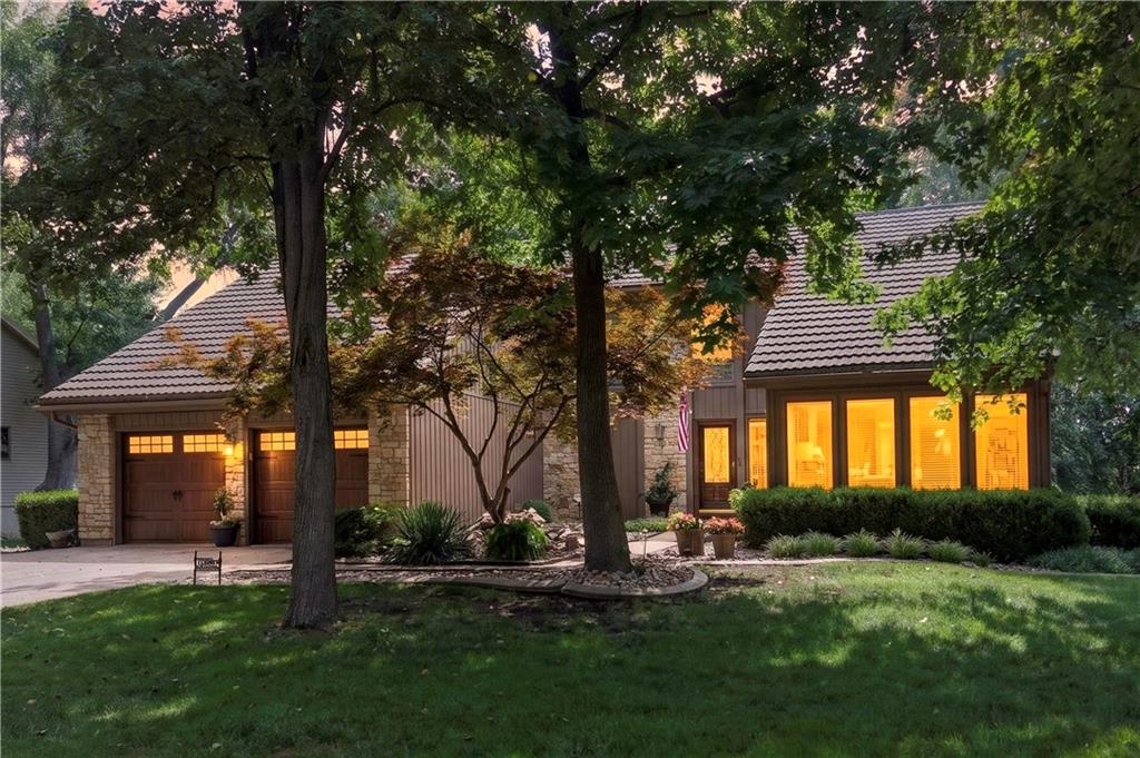 Experience lakefront living at 4498 SW Bowsprit Dr, situated on a waterfront lot in Lee’s Summit’s Raintree Lake community with a transferable boat slip directly behind the house. The main level offers two distinct living rooms, a half bath, and access to two covered back decks overlooking the water. Featuring 3 bedrooms and 2 full baths, this home provides direct access to the lake, local community amenities, and Lee's Summit schools.