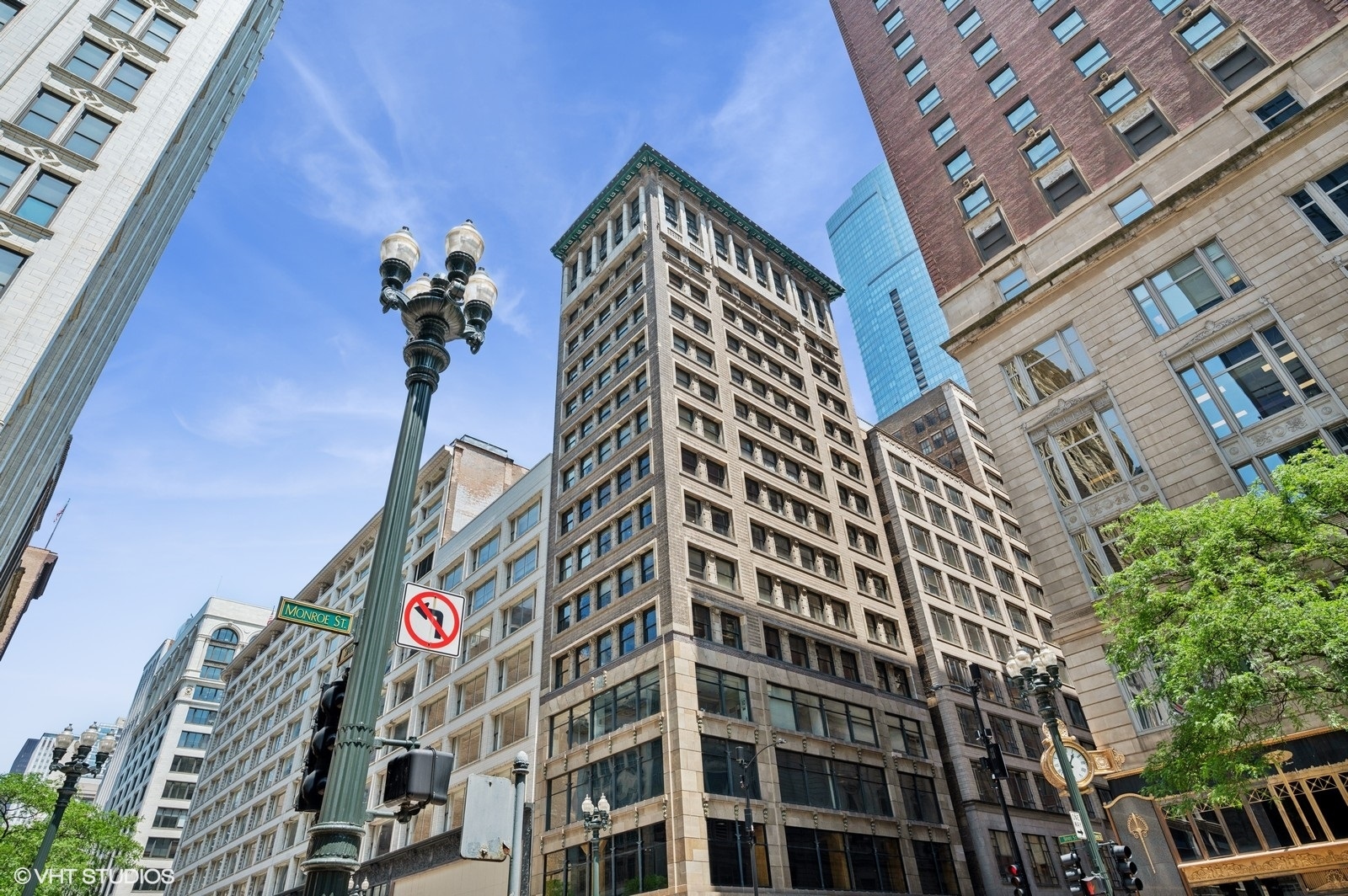 Don't miss this phenomenal opportunity to own a full floor in the Mentor Building, an architectural masterpiece designed by Howard Van Doren Shaw in 1906. Enter this beautifully designed space through the large entry foyer accessed by elevator with private key code.  This  unique home is comprised of the owner's residence and private business enterprise and zoned for both residential and commercial.  The gorgeous Master Bedroom features a custom  built-in media center and large walk-in closet with "his and her" storage and a window providing natural light.   A wall of south facing windows floods the room with sunlight while french doors lead to your discreet private balcony, offering the perfect quiet retreat for morning coffee or a glass of wine @ sunset. The Master Bath features luxury finishes with custom tile work, quartzite counter and shower surround, an extra wide shower with dual spray, built-in bench and river rock basin beautifully complemented by custom cabinetry. The 2nd bedroom is accessed off the LR through frosted glass french doors affording privacy and flexibility for a den or overflow entertaining space.  Kitchen highlights include stainless steel appliances and marble counters with undermount dbl sink, 5 burner gas stove, new refrigerator and a generous island ideal for entertaining or casual dining with its classic cabinetry and stunning glass pendants. The 2nd bath is accessed off the hallway and was completely renovated 2 yrs ago with new shower, sink, mirrors, cabinets and washer/dryer.  Building amenities include a fitness room with all new machines, rooftop terrace with partial lakeview, bike room and storage. Gorgeous SW light from 14 windows floods this full floor unit with high ceilings in a spectacular location close to the lakefront, Orchestra Hall, Millennium Park, The Art Institute, Buckingham Fountain and the Theater District.
