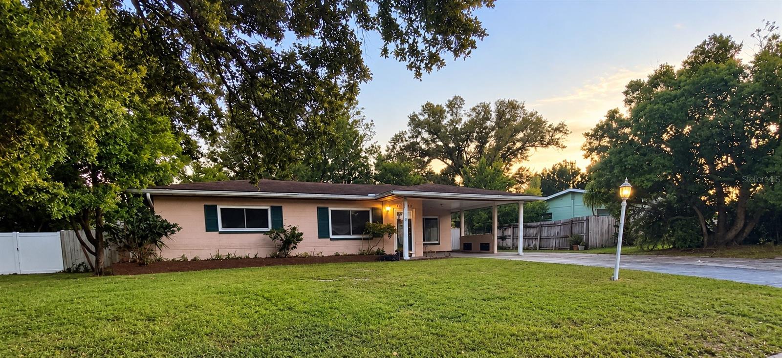 Fresh, move-in ready block home on a quiet dead end street in Largo, under ten minutes to Indian Rocks Beach. This 2 bedroom, 2 bath home has been completely refreshed with full interior paint, new laminate flooring throughout, and new light fixtures. French doors open from the living area to an enclosed Florida room with windows on two walls and its own exterior door, ready to be your home office, den, or guest space. The roof was replaced in 2015 and the sewer line in 2017, both permitted. Outside, the landscaping has been refreshed and the exterior pressure washed. Two storage sheds convey, including a powered workshop shed with working outlets. A carport plus driveway space gives you parking for four. Concrete block construction, FEMA Flood Zone X, a non evacuation zone, and county water and sewer give this home a strong insurance and storm profile. No HOA and no CDD. Close to shopping, dining, parks, and the Gulf beaches, with easy access to the rest of Pinellas County. Coming soon. Reach out now to be first in line for showings.