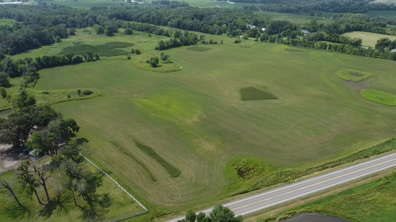 Welcome to the new Upward Acres just west of Corcoran featuring 6 new acreage properties spanning 62+ acres of serene rural countryside. Offering abundant wildlife, long panoramic walkout views and phenomenal access to Maple Grove/Plymouth + I94 Interstate....you get the best of both worlds; country living within 10-15 minutes of shopping, parks, trails, food, restaurants, coffee, grocery, etc. Within the new development there are 5 new acreage lots PLUS the original homestead + 60x30 pole shed. Of those 5 new acreage lots, 5 are sold leaving this Lot 6 the last open/vacant lot remaining. It is a fairly open lot that will have your future home orientation facing east or southeast and the front/face of the home likely facing west or northwest. All homes will be built exclusively by JPC Custom Homes. Out-buildings and barnyard animals are allowed, see City of Corcoran Land-Use plan for exact # of animal units allowed per acre. Development includes Covenants and Declaration which will be overseen by the developers through the build-out/completion of all 5 new homes. No HOA or monthly/annual fees. Inquire today to learn more!