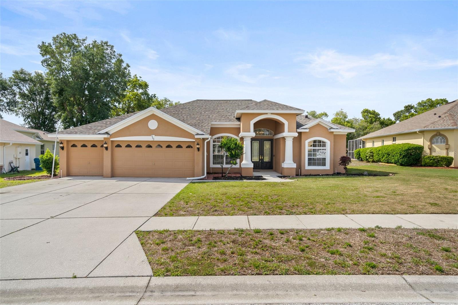Welcome to Pristine Place, one of Spring Hill's most desirable gated communities, where comfort, privacy, and the true Florida lifestyle come together. From the moment you arrive, a sense of tranquility is palpable: quiet streets, well-maintained homes, and a secure environment that's hard to find elsewhere. Stepping through the elegant double glass doors, you'll find a light-filled interior with an open layout that feels welcoming from the first moment. Decorative molding details and spacious rooms create a warm yet elegant ambiance.The kitchen is at the heart of the home, featuring granite countertops, ample cabinetry, and a welcoming breakfast nook—perfect for starting the day calmly. It flows seamlessly into the main living area, ideal for entertaining and socializing. The family room, with its inviting fireplace, offers views of the pool, creating that indoor-outdoor connection that buyers are looking for.The master suite is designed for comfort and privacy, with direct access to the pool, a spacious walk-in closet, and a spa-like bathroom with double vanities, a garden tub, and a separate shower. The split-floor design provides added flexibility, including a private bedroom and en-suite bathroom with a pocket door, ideal for guests, family, or as a workspace.Stepping outside, the property truly shines. The screened pool, infinity spa, and lanai create a private retreat perfect for relaxing, entertaining, or enjoying the Florida lifestyle year-round. The pool's safety system adds extra peace of mind.This property inspires confidence thanks to significant improvements already made:• Completely new roof recently installed• Durastar 5-ton air conditioning system with only 1 year of use• Whole house water softener and additional system in the kitchen• Security system for doors and windowsPristine Place is a gated, regulated community, renowned for its meticulous maintenance and low HOA fees. Residents enjoy a clubhouse, community pool, fitness center, and walkable streets, making it one of the most stable and desirable areas in Spring Hill.The location is another great benefit:• Approximately 5–10 minutes from shops, supermarkets and restaurants• Close to hospitals and medical services• Quick access to Suncoast Parkway for easy travel to Tampa and Clearwater• About 10–15 minutes from Weeki Wachee Springs, ideal for kayaking and nature• Approximately 20–25 minutes from Pine Island Beach, with access to the GulfThis property offers more than just features; it offers a lifestyle experience: security, comfort, and convenience in a prime location. Homes in gated communities with these amenities and lifestyle tend to stand out quickly. Don't miss out on the opportunity to schedule your exclusive tour and uncover all the amazing features of this home. Home has video / audio  cameras inside home.