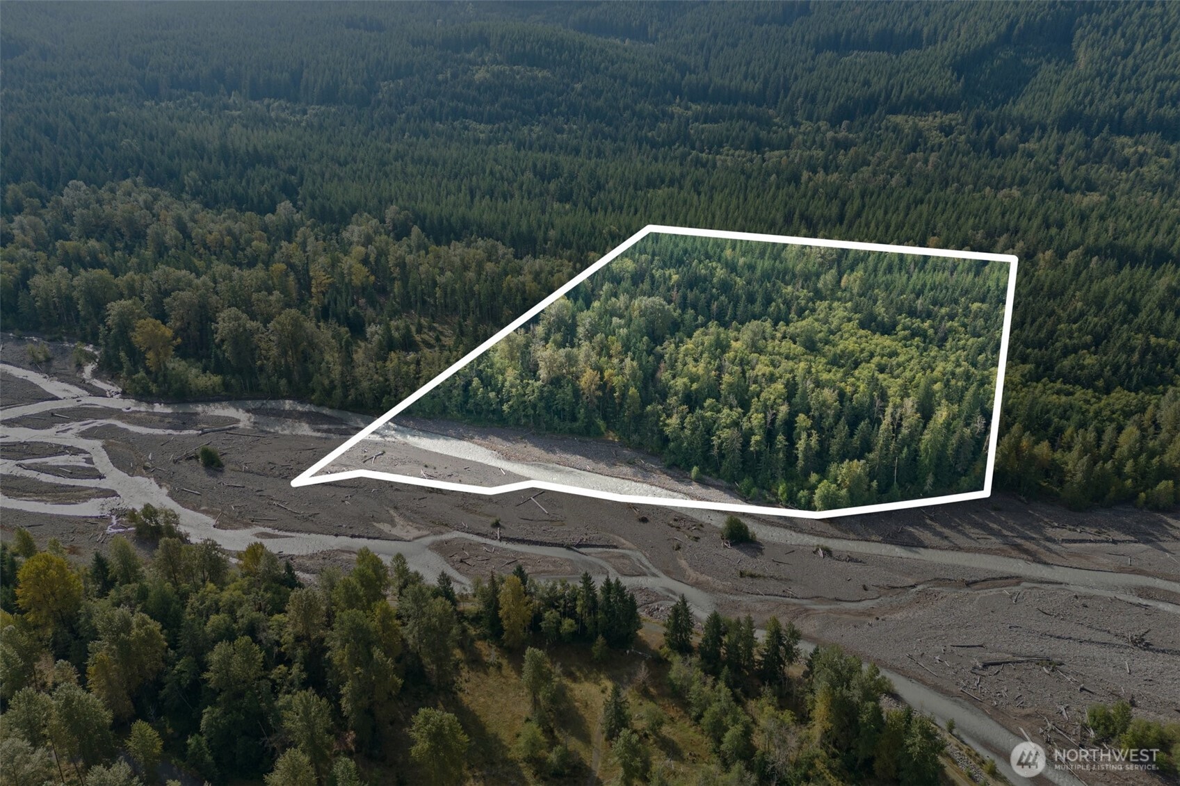 Escape to over 25 acres of breathtaking recreational land along the beautiful Nisqually River, just minutes from the Nisqually entrance to Mount Rainier! This serene property even offers a small ideal spot for building your potential dream cabin, surrounded by stunning natural beauty. Imagine hiking through lush forests, camping under starry skies, and exploring the riverfront right in your own backyard. With abundant wildlife and endless outdoor adventures, this is the perfect getaway for hikers, river enthusiasts, and anyone looking to reconnect with nature. Currently in a forest tax classification. Don't miss the chance to own this slice of paradise! Buyer to verify all. Embrace the tranquility and adventure that awaits you here!