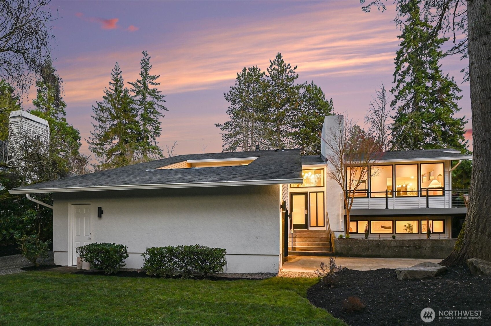 Prime neighborhood, modern Mid-Century home. Soaring cathedral ceilings and west-facing peekaboo lake views highlight the elegant living and dining spaces. The chef’s kitchen appliances, quartzite waterfall countertops and perfect for both everyday living and entertaining. Indoor-outdoor living with a private backyard deck & patio. Welcome your guest from the front deck.  A dreamy primary suite with luxury bathroom, his and her closets, and private deck. Rare 4+ cars park driveway an attached two-car garage. Five bedrooms plus flexible bonus rooms offer endless options for a home office, studio, or exercise space. Pre-inspected for peace of mind. Just minutes to waterfront parks, scenic trails, shopping centers, and award-winning schools. Convenience the schools bus nearby for pickup & drop off!