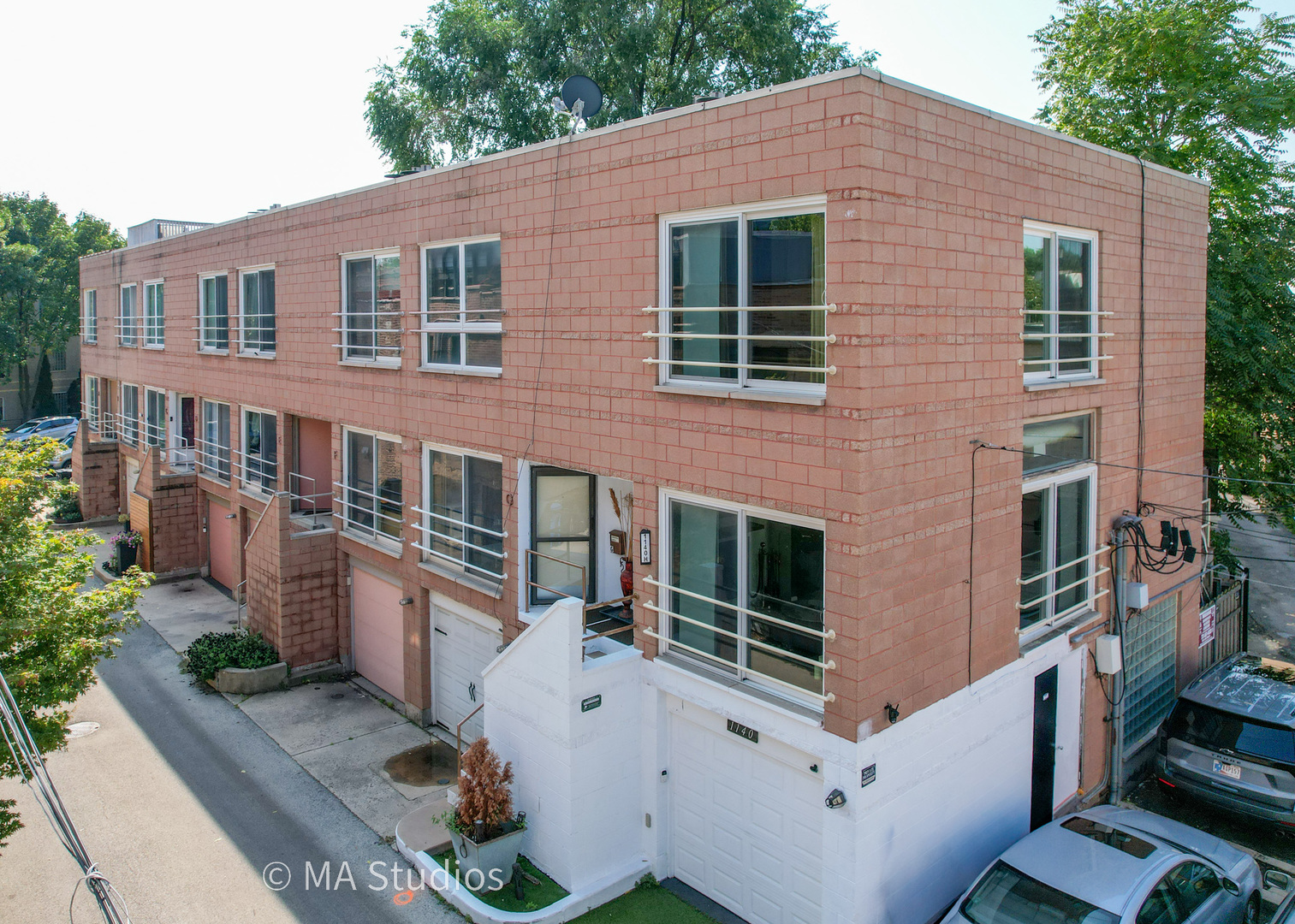 Rare End-Unit Townhome with Deck, Patio & No HOA in Lakeview/Wrigleyville  Flooded with natural light from three Juliet balconies, this 2BD/2BA townhome offers ~1,350 sq ft across multiple levels. The open main floor is perfect for entertaining, while the lower level provides flexible space for a bedroom, office, or gym. Upstairs, the private primary suite includes a full bath and a walk-in closet large enough to double as an office or study.    Enjoy two outdoor spaces-a main-level deck with an attached gas grill plus a lower-level patio-ideal for grilling, relaxing, or hosting on game days. An attached garage adds convenience. Built in 1990 with central A/C and gas heat, this home has no HOA fees.    Located in the heart of Lakeview/Wrigleyville, just steps to Wrigley Field, Southport shops, dining, transit, and top-rated Nettelhorst Elementary.     Explore the 3D Virtual Reality Tour-glasses not required, but if you have them, jump in for your own virtual reality tour! And don't forget to review the floor plans to see the smart, functional layout.