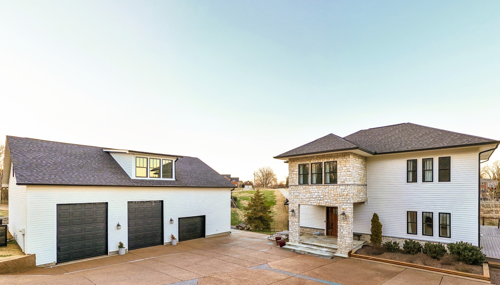 Rare Old Hickory Lake Find — Sellers Ready to Move! Rare Income Potential Opportunities like this don’t come along often. Experience the best of Old Hickory Lake in this striking modern waterfront home-perfect for enjoying Tennessee sunsets and year-round lake living. Two dock slips provide direct access to Old Hickory Lake, ideal for boating, paddleboarding, fishing, and relaxed days on the water. Gigantic 50x40 high-bay garage built for large boats, RVs, muliple vehicles, ATV's and lake toys with room for a full workshop—perfect for collectors or lake-lifestyle enthusiasts. Above the garage, a private 2-bedroom apartment creates the perfect setup for multi-generational living, hosting extended guests, or generating rental income. Located in one of Mt. Juliet’s most sought-after lake communities, this property combines modern design, flexible living options, and premier lake frontage — an ideal opportunity for buyers seeking a true Old Hickory Lake lifestyle with investment upside.