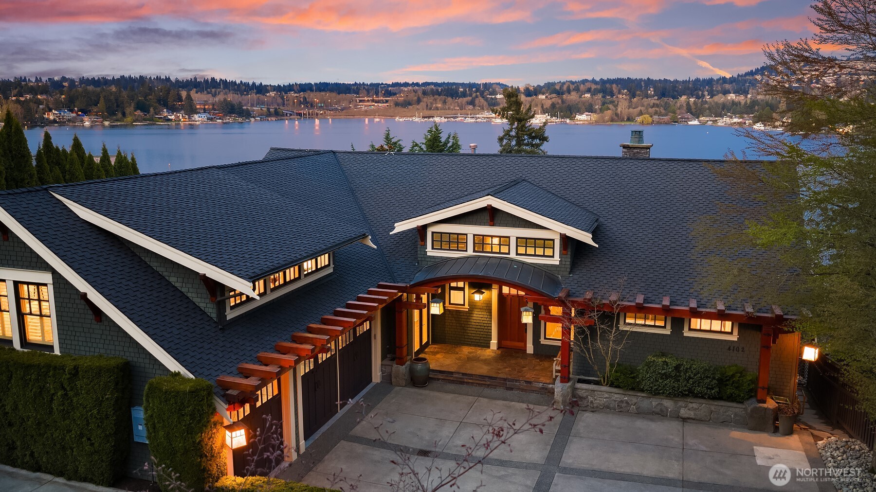 From the shimmering lights of Bellevue to the expansive lake vista beyond, this gorgeous Modern Craftsman is perfectly positioned to capture every moment of the view.