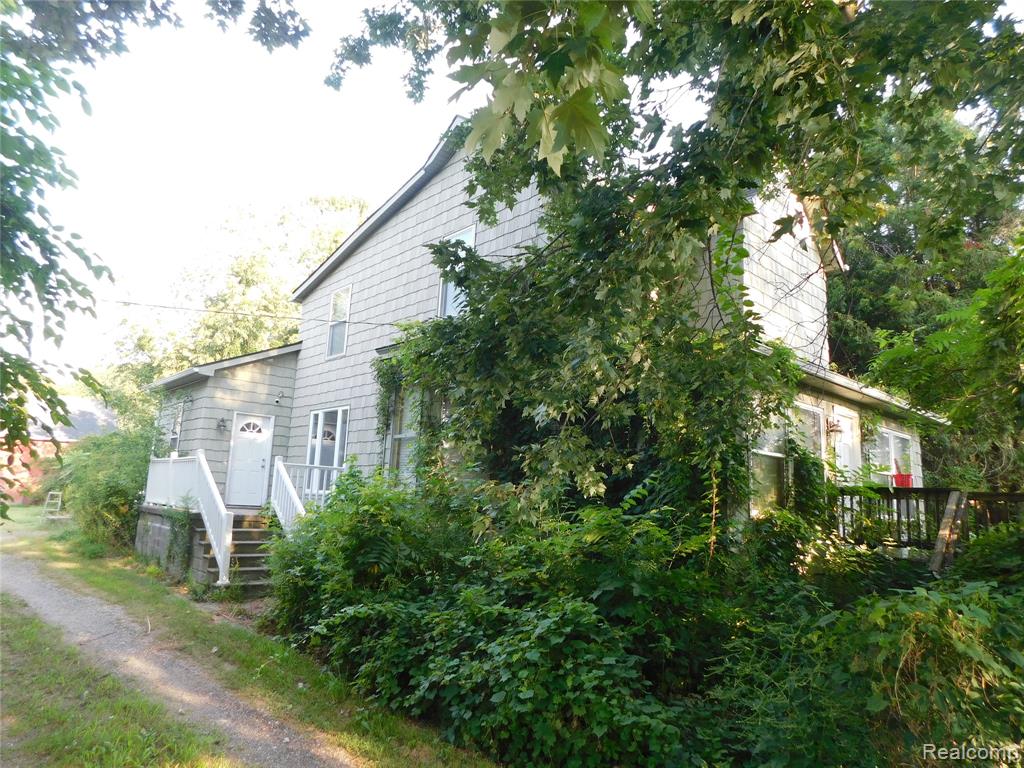 CHECK OUT THIS SPACIOUS COLONIAL SITTING ON ALMOST 8 ACRES. SURROUNDED  BY MATURE TREES AND PRIVACY. HOME OFFERS 4 BEDROOMS, 2 KITCHENS AND 3 FULL BATHS.  HAS A MOTHER IN LAW SUITE AS WELL.  OAK  CABINETS IN THE KITCHEN AND ALL APPLIANCES INCLUDED. HAS 2 BARNS AND A CHICKEN COOP. ONE OF THE BARNS WAS USED BY A LICENSED CAREGIVER.  ALL ACCESSORIES AND SUPPLIES ARE NEGOTIABLE. HAS 54 LIGHTS AND 3 AIR CONDITIONS.   BUYERS PLEASE CONFIRM WITH THE TOWNSHIP WITH WHAT ANIMAL ARE ALLOWED.  HOUSE IS LOCATED MINUTES FROM SHOPPING AND LOCAL FREEWAYS
