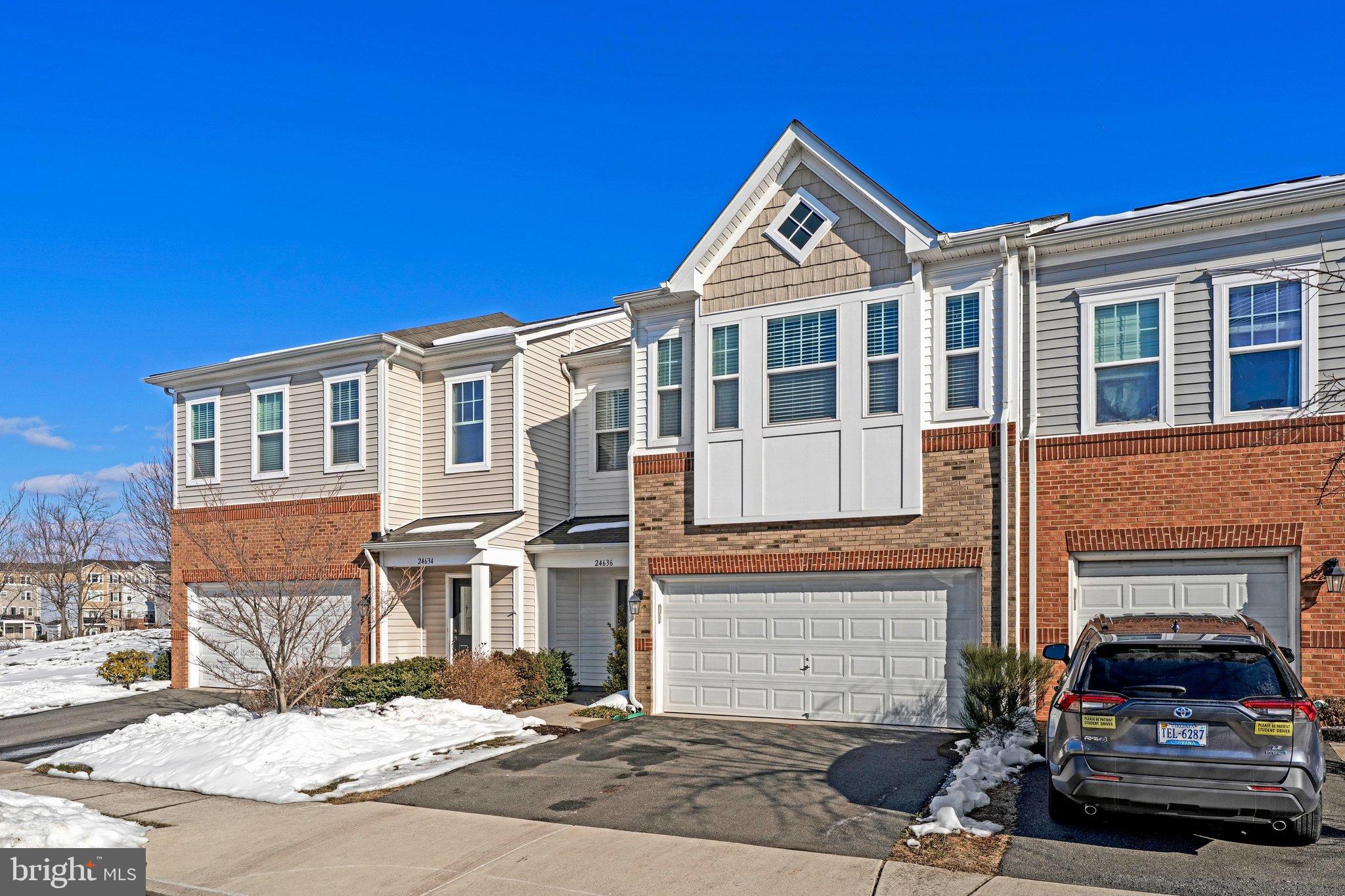 This weekend come and visit this beautifully maintained four-bedroom, four-bathroom villa-style home ideally located within walking distance of schools, shops, restaurants, and the Stone Ridge Library. Thoughtfully designed and impeccably cared for, this home offers both comfort and convenience in a wonderful community setting.The main level is designed for easy living and gathering, with an open-concept layout centered around a 10 foot island. The kitchen features a five-burner cooktop with stainless steel hood and flows seamlessly into the dining area and inviting family room with a cozy gas fireplace. With such a large open space, there are so many ways to use this main level to fit your family's needs. So many properties in the area consist of a flight of stairs to the main floor - carrying groceries and entertaining is so much easier in this home! Upstairs, you’ll find four spacious bedrooms and three full bathrooms, each with generous closet space and beautiful natural light throughout. The primary suite is a true retreat, featuring two large walk-in closets and an ensuite bath with dual vanities, a walk-in shower, and a private water closet. A major everyday luxury: the laundry room is conveniently located on the bedroom level—no hauling laundry up and down the stairs. Out back, a welcoming patio and fenced yard provide a perfect space for relaxing or entertaining, all while backing to a peaceful common area for added privacy.Complete with a two-car garage, additional driveway parking, fresh paint, and brand-new carpet throughout—this home is truly immaculate and move-in ready.