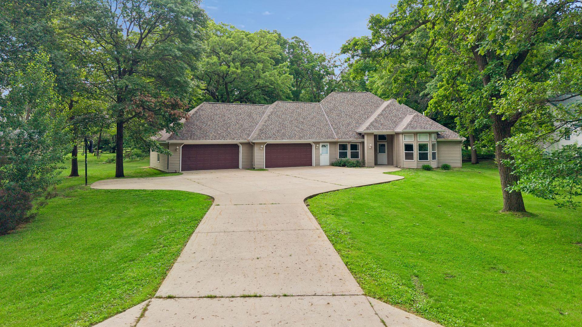 Beautiful and spacious one-level patio home located on a nearly one-acre lot on the Little Falls golf course.(18 Hole Championship Golf Course) This home offers 4 bedrooms and 3 full baths with all living facilities on the main level with efficient in-floor heating throughout the home for year-round comfort. In addition, the home features several new mini-split units installed throughout, providing efficient cooling in each room and enhanced temperature control during the warmer months.The open layout includes a large kitchen with center island, generous dining space and a bright living area with wide views of the fairway. The primary bedroom includes a private full bath and walk-in closet. Two additional bedrooms are connected by a convenient Jack-and-Jill full bath, while the fourth bedroom offers flexibility for guests, an office, or hobby use.A standout feature of this property is the oversized 4-stall attached garage offering abundant space for vehicles, storage, and projects. The bonus room above the garage provides additional potential for storage, a workshop area, or a future game or craft room.Enjoy outdoor living on the large covered patio overlooking the golf course. With nearly an acre of land, the property offers privacy, room to spread out, and a peaceful setting.Additional updates include a 1-year-old roof and a newer septic system providing an extra peace of mind. This home is virtually staged.