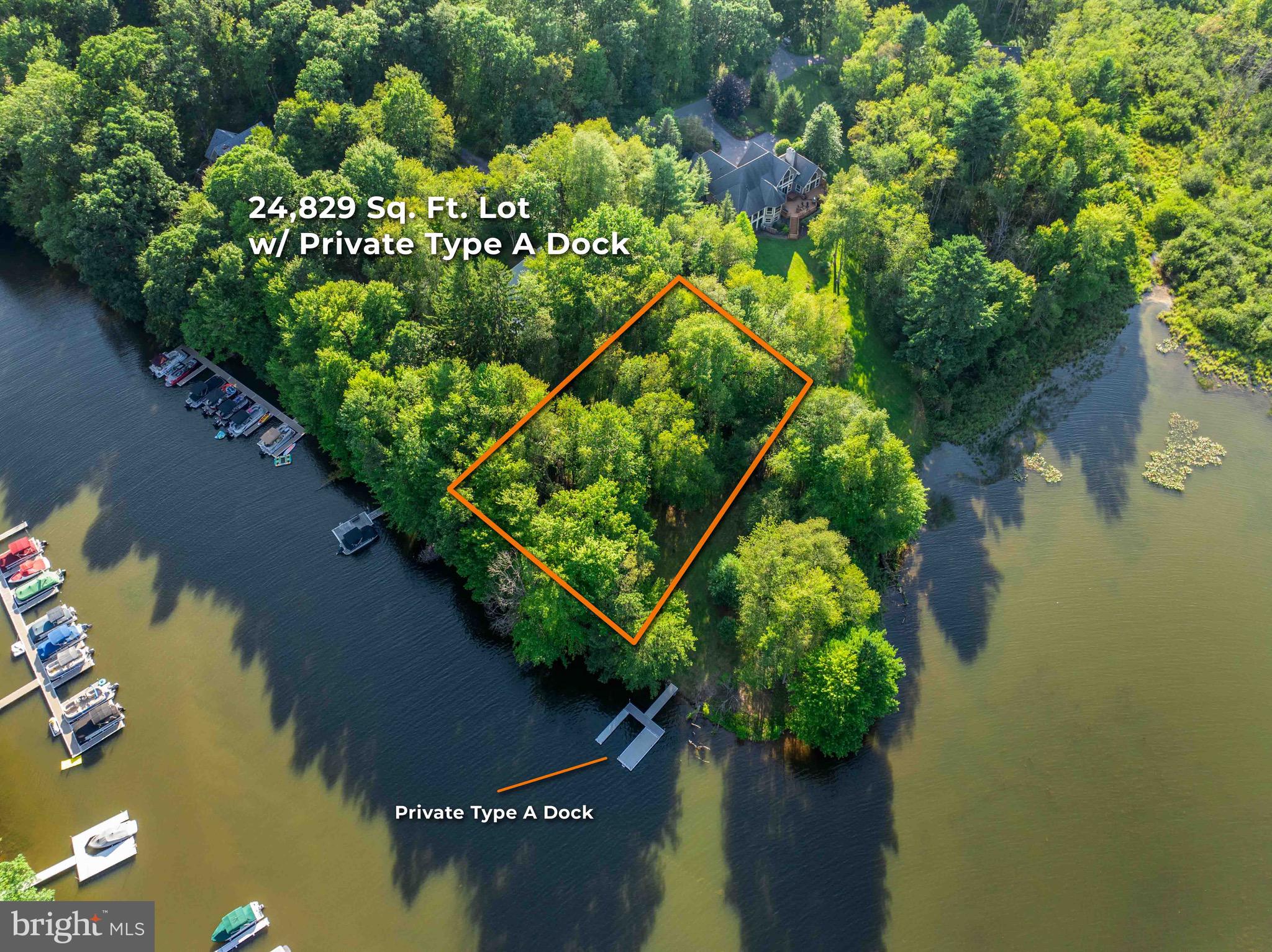 Exceptional 0.57-acre waterfront lot offering approximately 314 feet of shoreline on a quiet point in a protected cove at Deep Creek Lake. The wooded setting provides privacy and an attractive location for your future lake retreat.  A Type A dock conveys with the property, public sewer is available. The parcel is not located within the Heron Cove HOA but has access through the neighborhood by easement, subject to an annual road maintenance fee. Convenient mid-lake location with easy access to area shopping, dining, recreation, and entertainment. Buyer to verify building feasibility, setbacks, and all intended uses.