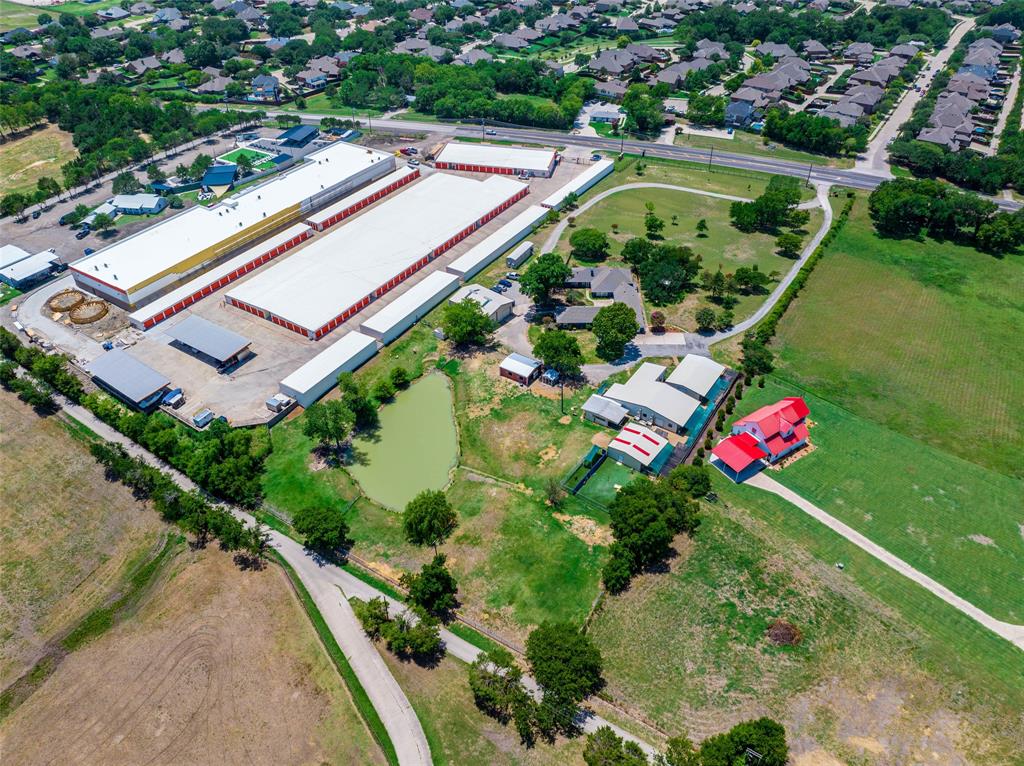 We are pleased to present this 5.56-acre property, 3,618 SF main house, and +- 8,698 SF of other structures now available for purchase in the booming community of Rockwall, TX. The property is located in a unique, un-zoned pocket outside of city limits and features an updated, 3,618 square-foot home with multiple, additional structures ranging from 1,600 to 3,000 square-feet. The site is fully fenced with a gated entrance facing State Highway 205 with over 24,856 vehicles per day. Situated in the developing area of north Rockwall right on Highway 205, the property is only minutes from Interstate 30 and just south of John King Blvd. There is also an operating business which comes with the purchase of the property (financials can be provided after signing an NDA). Please contact listing agent for more information.